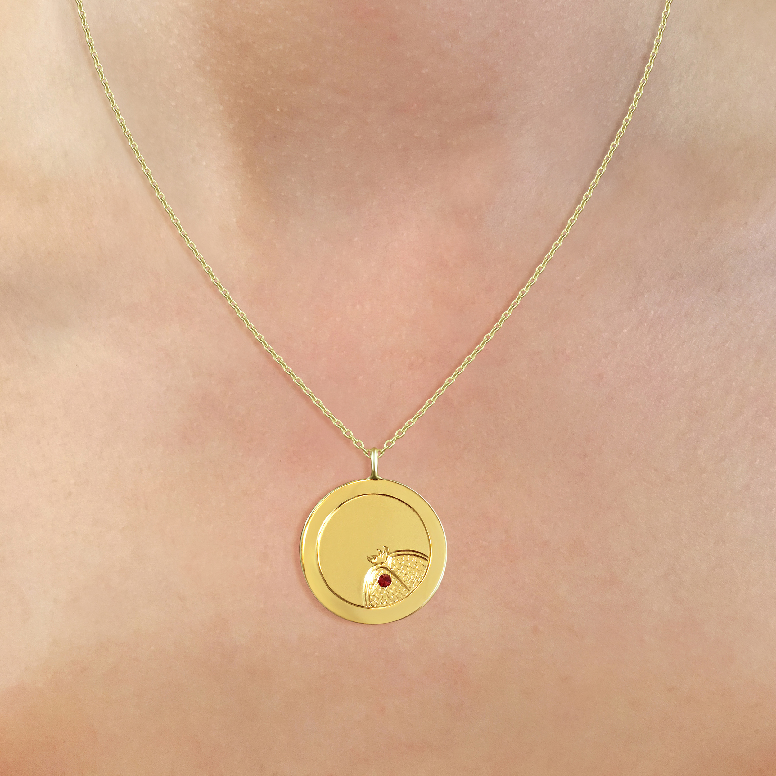 Bespoke-9ct-yellow-gold-disc-pendant-with-hand-engraved-pomegranate-1.jpg