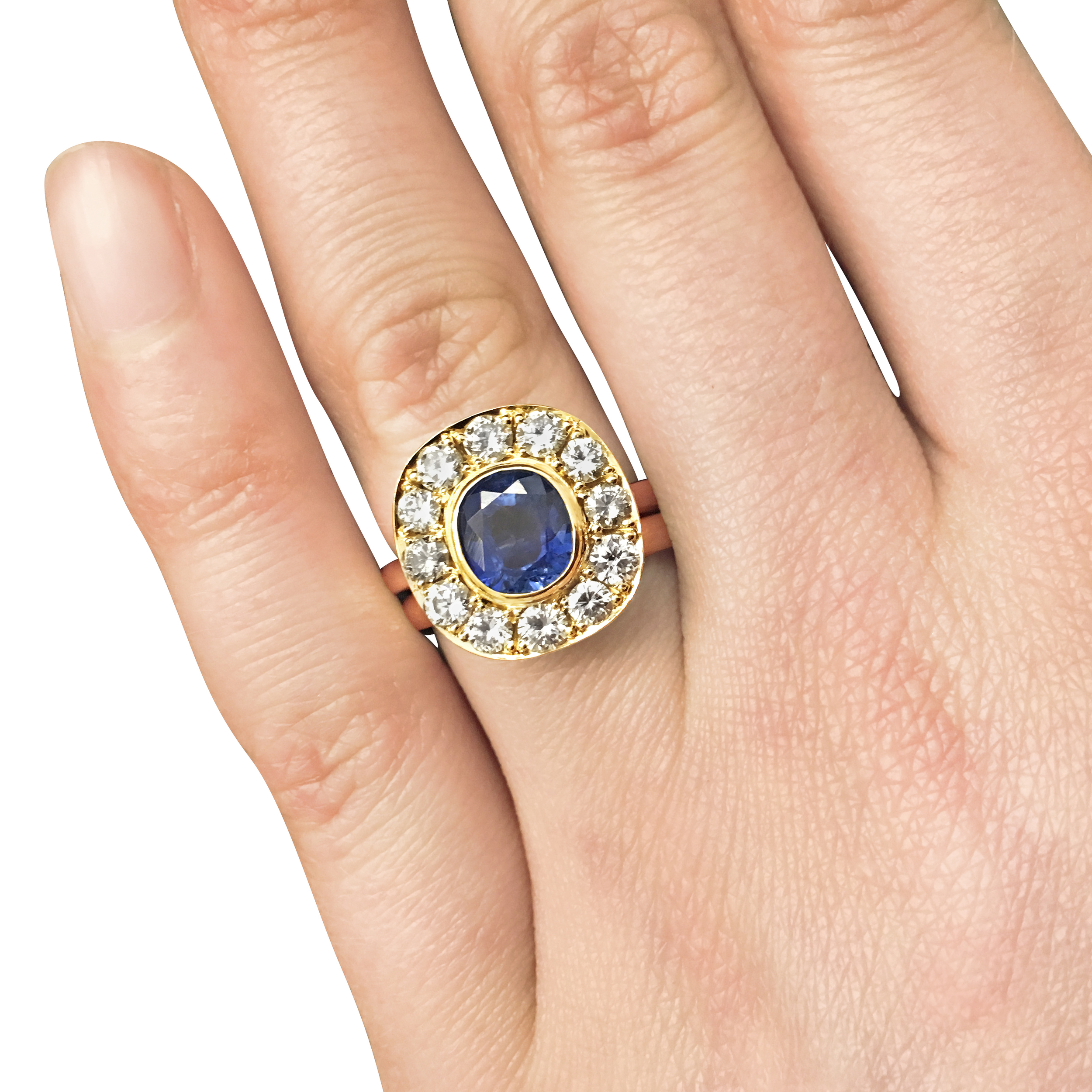 Sapphire-and-diamond-cluster-engagement-ring-in-yellow-gold-4.jpg