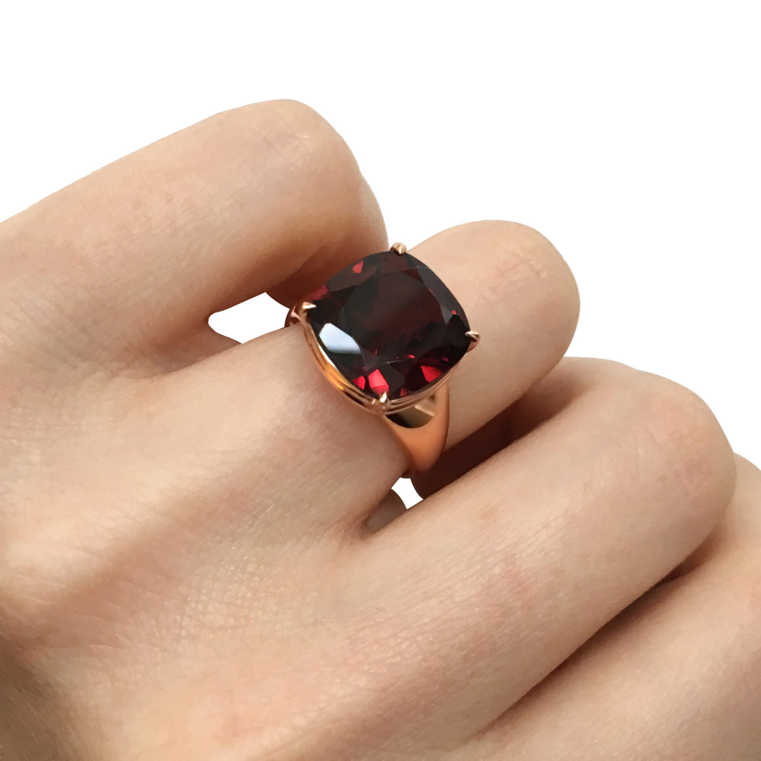 Bespoke cushion-shaped rhodolite garnet claw-set ring, mounted in 18ct rose gold hand