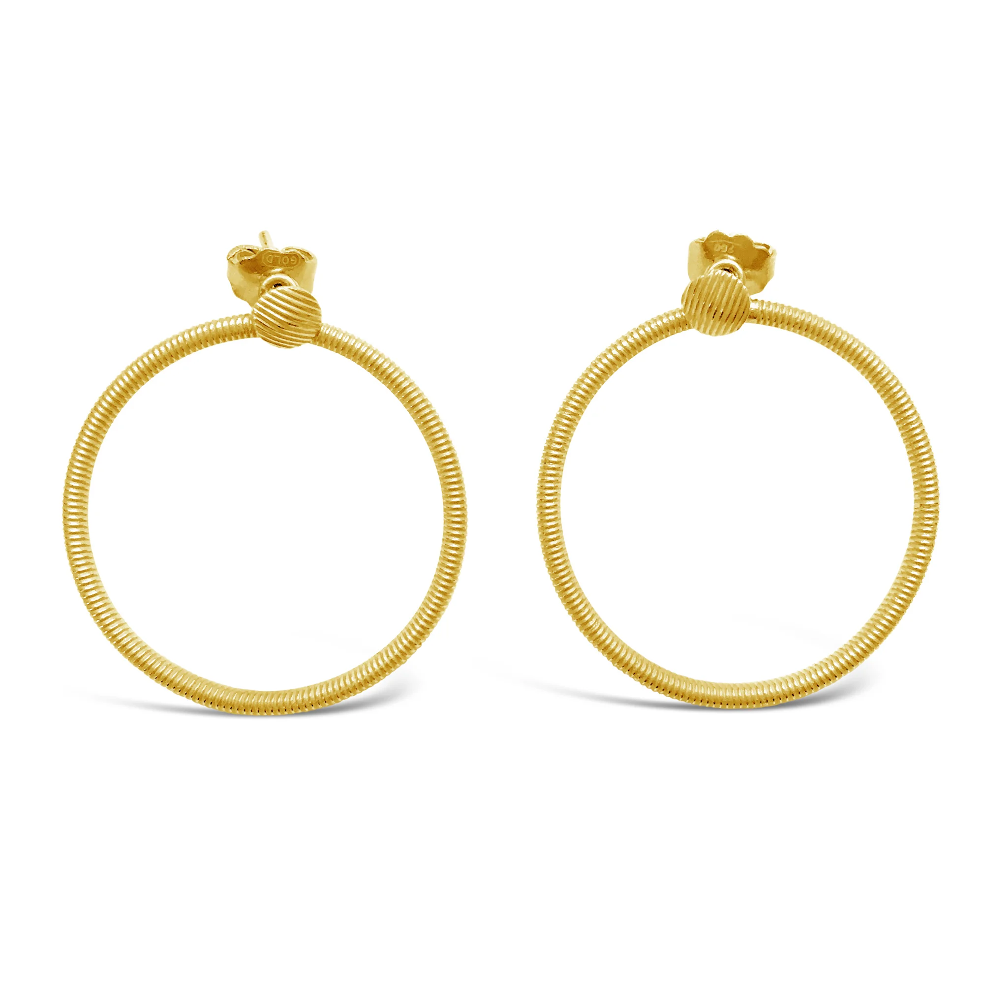 Large yellow gold ribbed hoop earrings