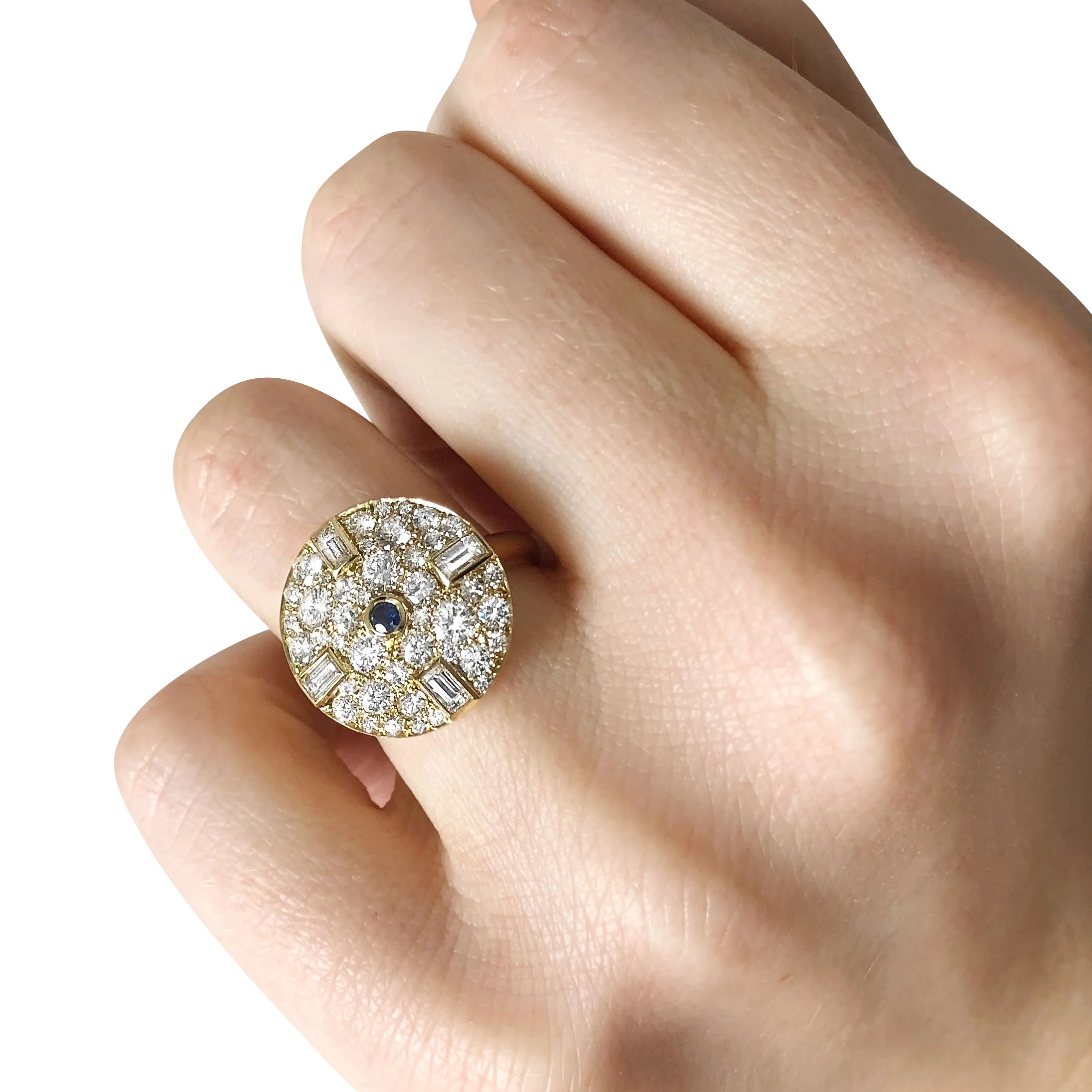 Bespoke sapphire, baguette-cut diamond and pavé-set diamond circular ring, mounted in 18ct yellow gold hand