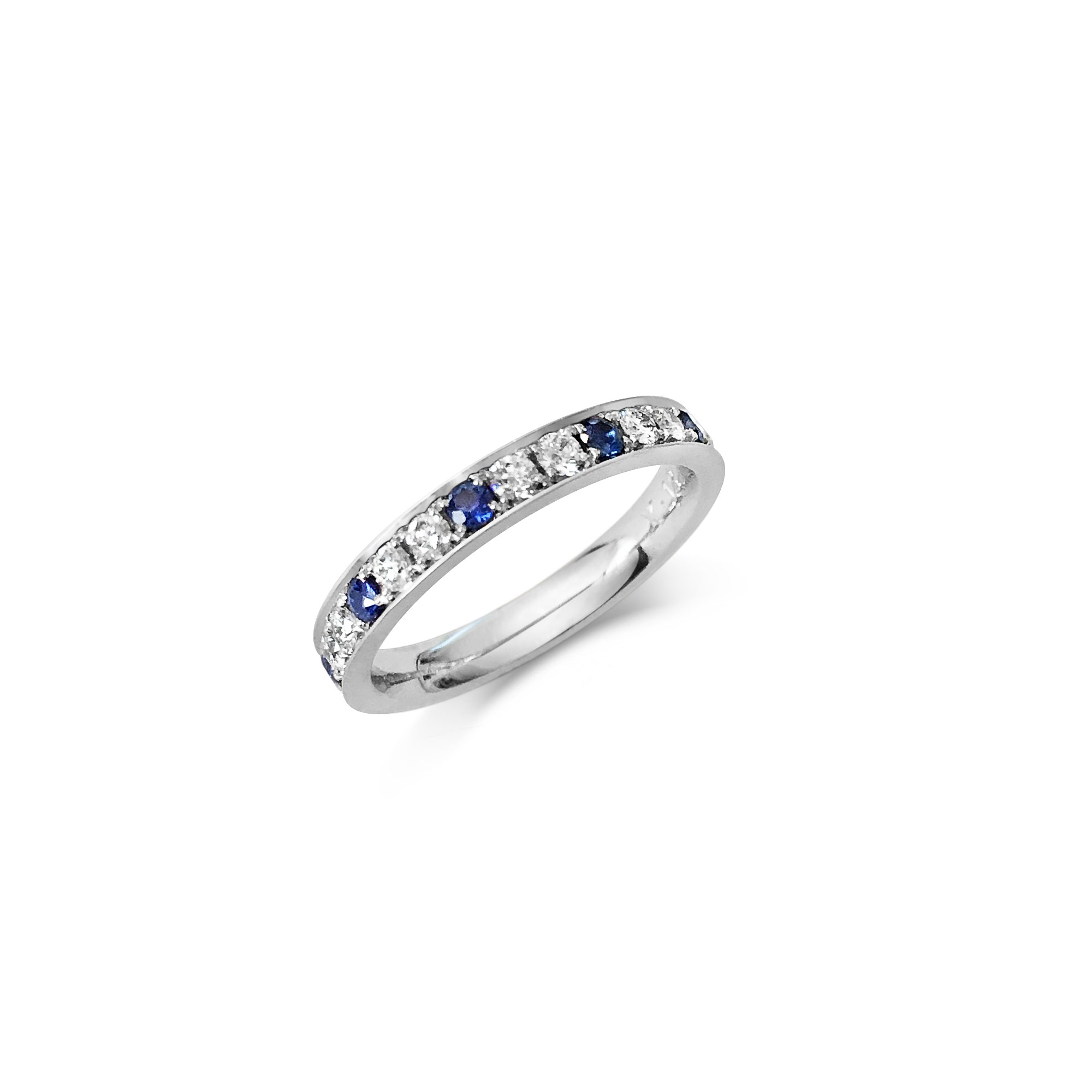 Sapphire and diamond eternity ring in platinum