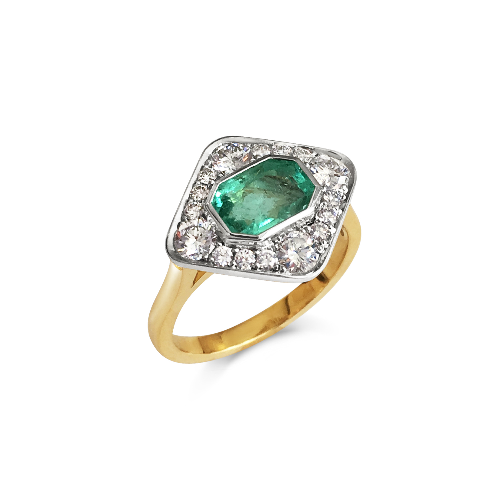 Emerald and diamond panel ring mounted in 18ct white and yellow gold