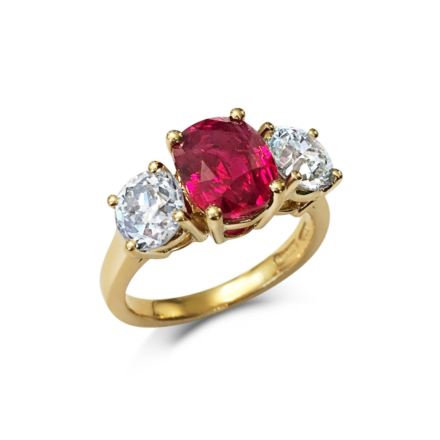 Ruby and Diamond three-stone ring mounted in 18t yellow gold. 