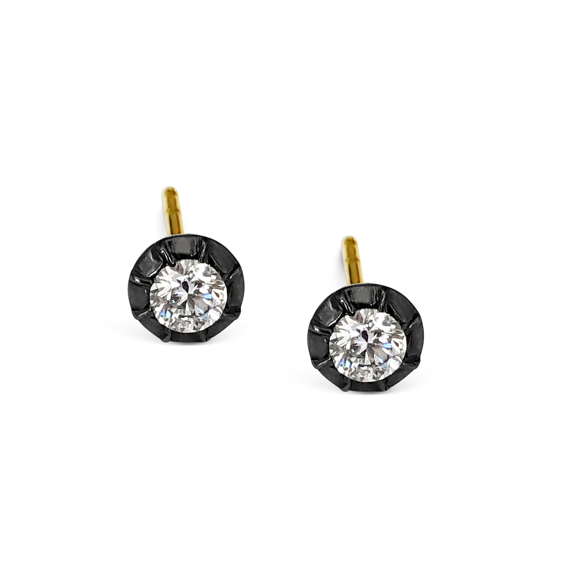 Diamond Stud earrings mounted in black rhodium plated 18ct yellow gold. 