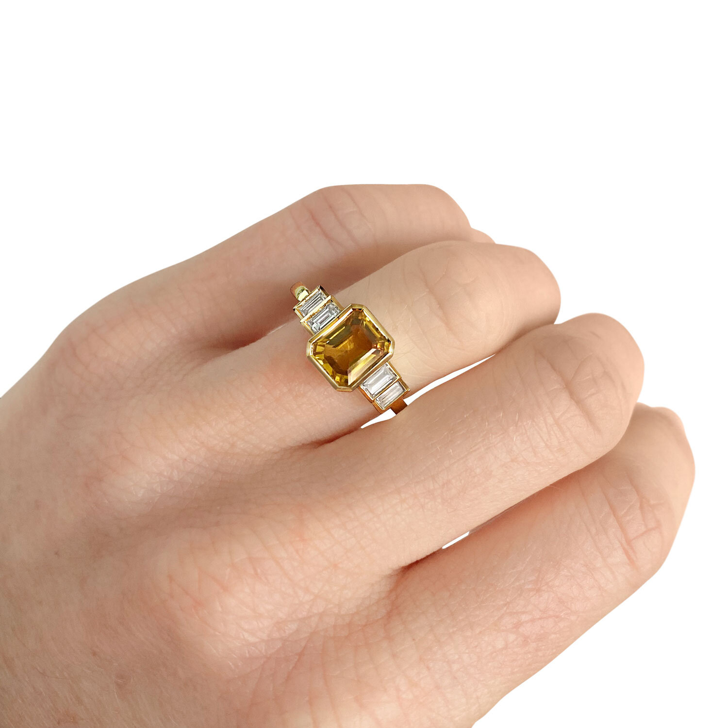 Yellow sapphire and diamond five-stone ring