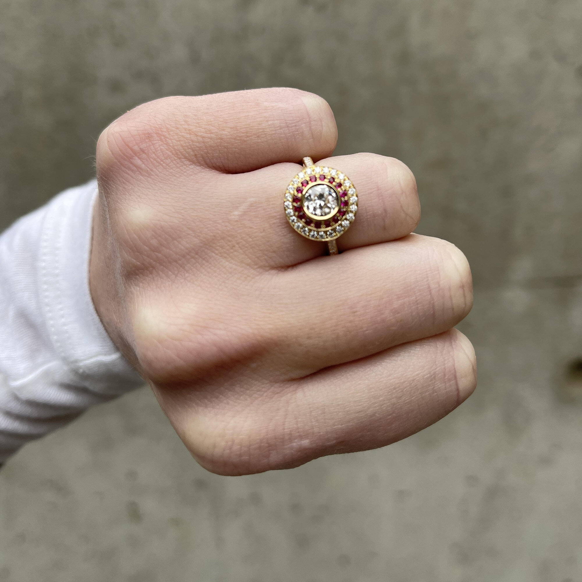 Ruby and diamond target ring on.jpg