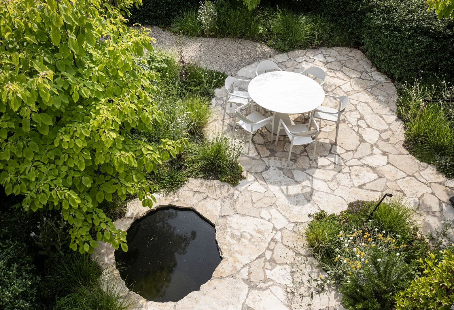 tuinarchitect_steyaert_brussel_leuven_water_pergola_jungle_groen_stadstuin_flagstone