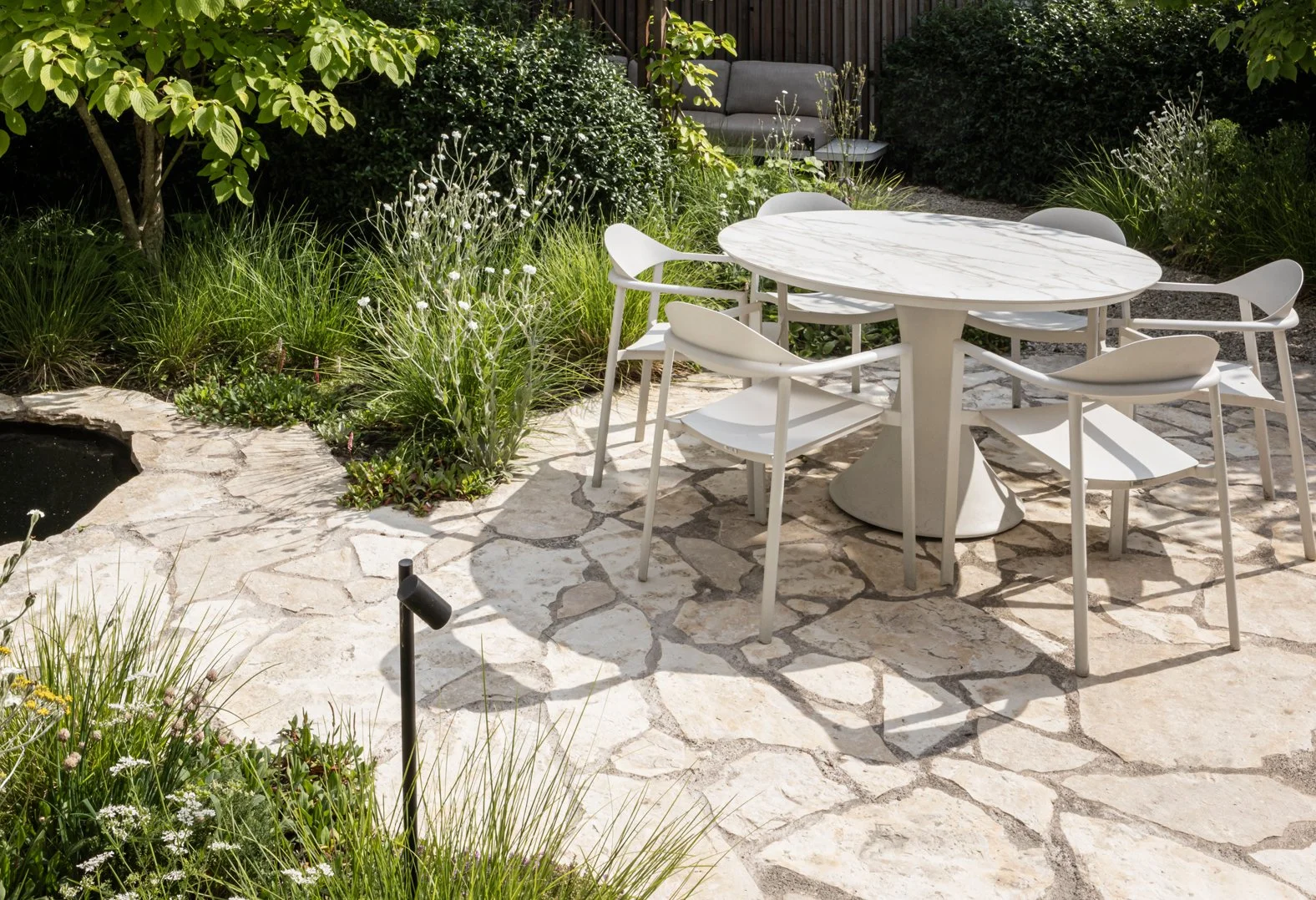 tuinarchitect_steyaert_brussel_leuven_water_pergola_jungle_groen_stadstuin_flagstone