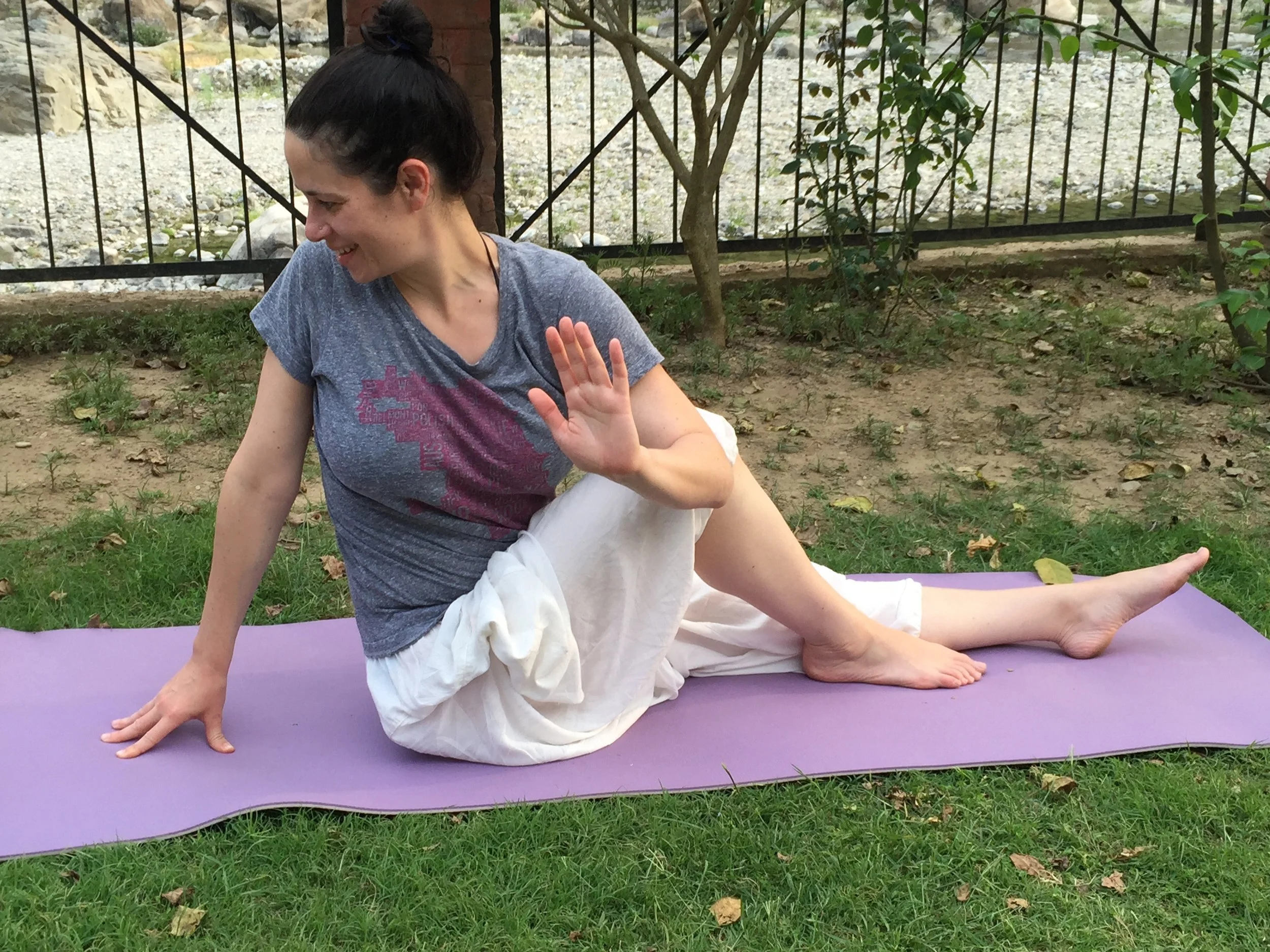  At teacher training in India, doing a spinal twist yoga asana (not talking to the hand) 