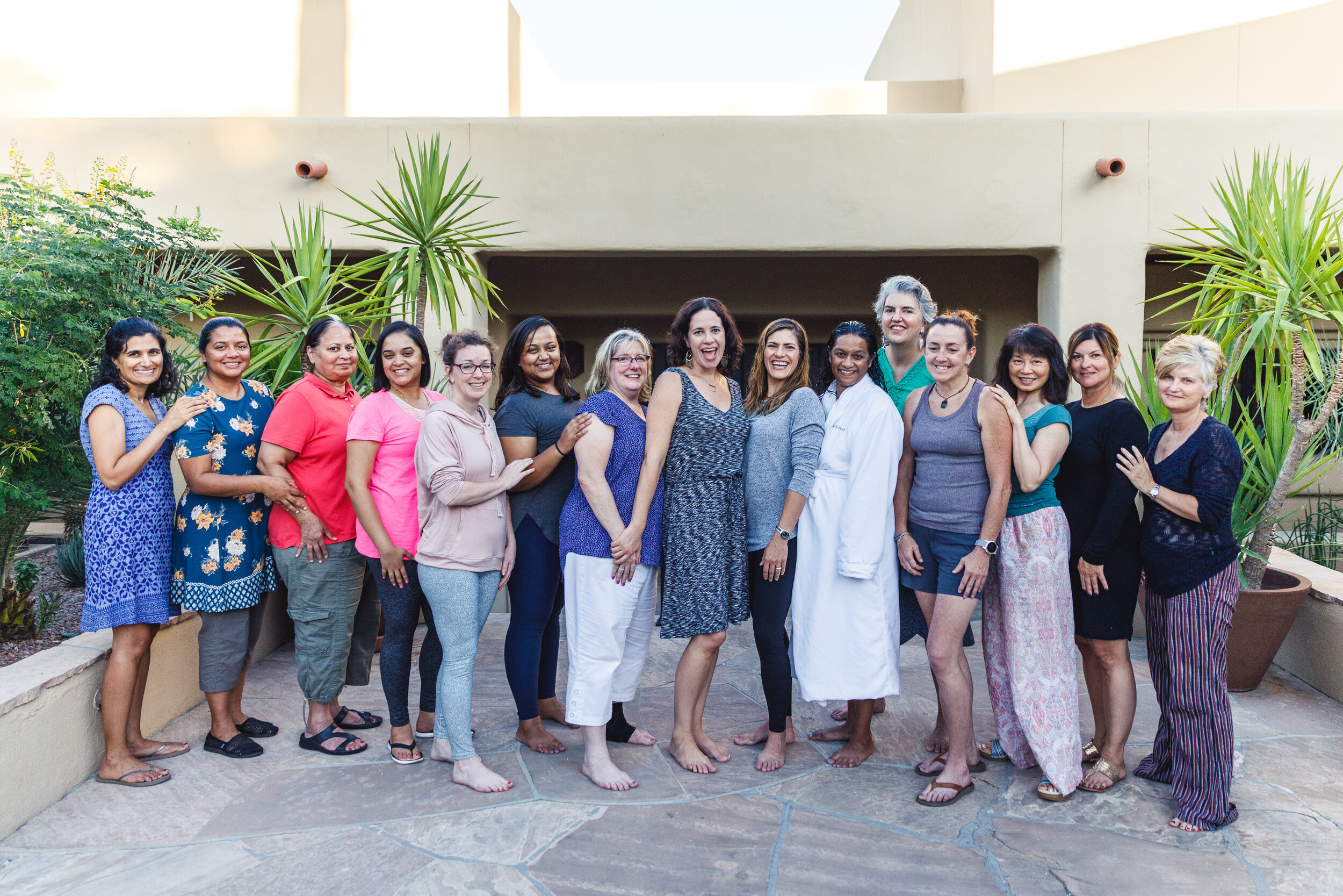 Dr. Jill Wener poses for a group photo with meditation retreat attendees.