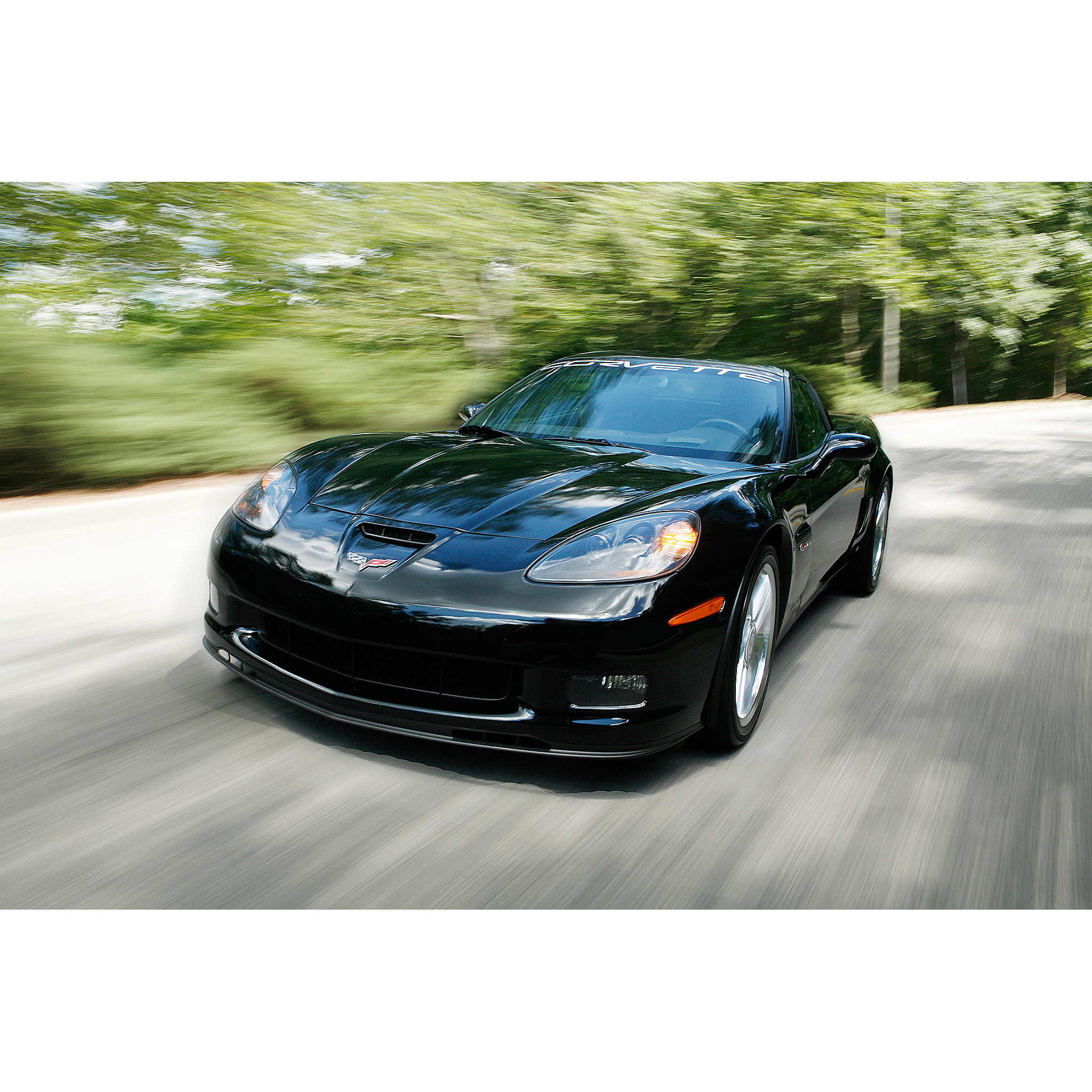 Photo of a Chevrolet Corvette driving down the road