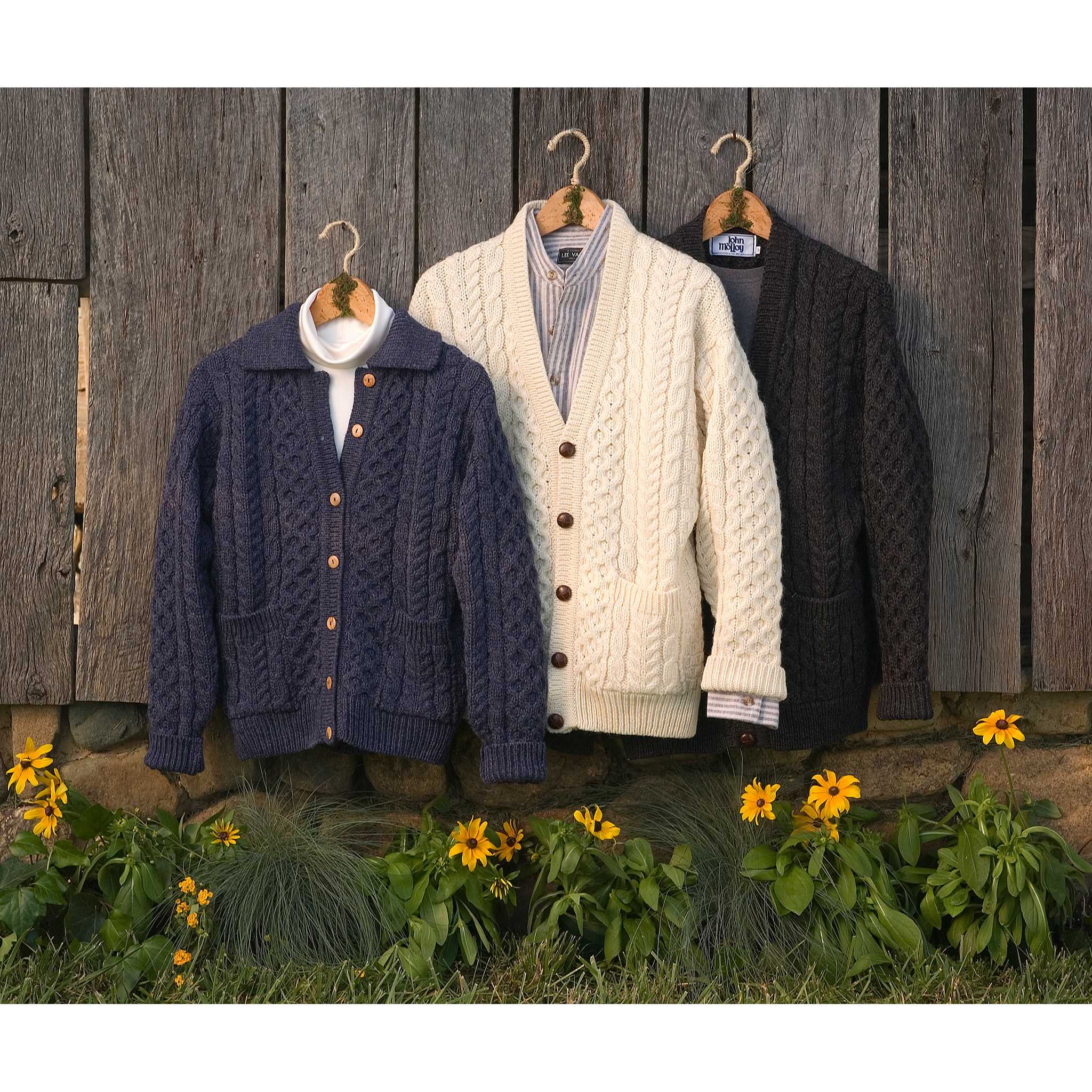 3 sweaters on a barn with flowers for website product sales