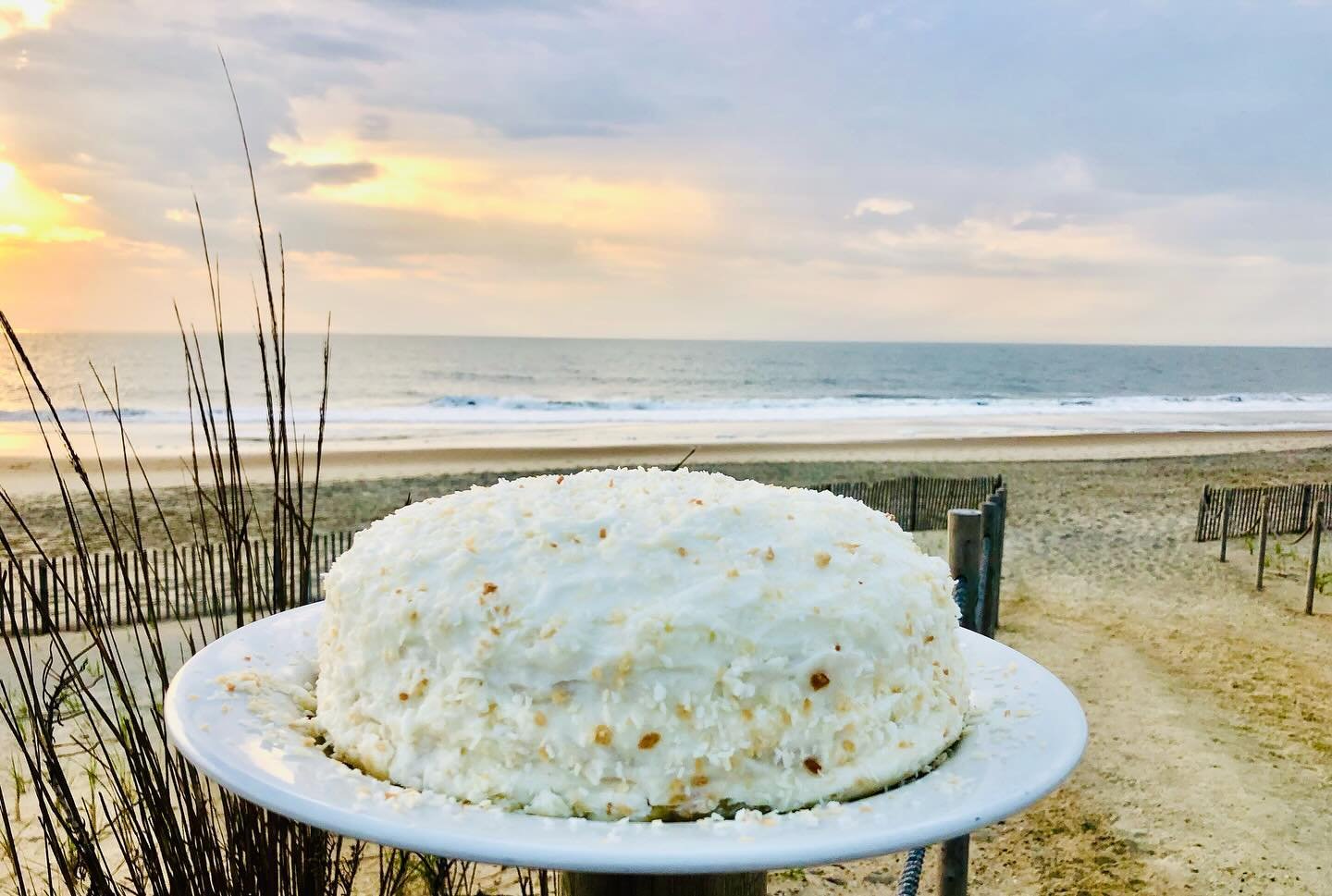 Our famous Pina Colada Coconut Cake. Pineapple Filling and Creamy Coconut Frosting. Made in house. Available for purchase via our website and for pick-up only at Sedona between 5:00pm - 7:00pm. Our address is 26 N Pennsylvania Ave Bethany Beach, DE 1