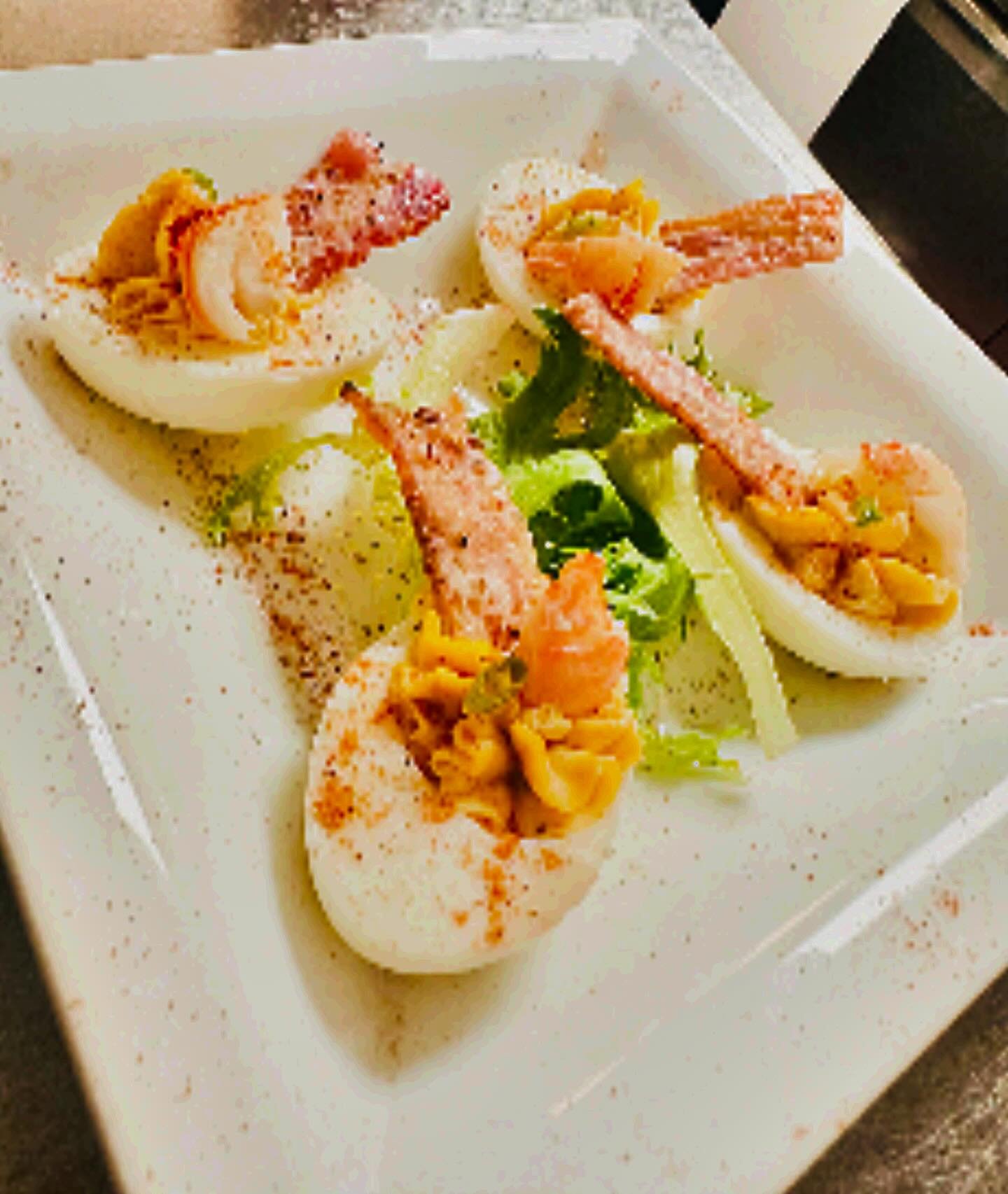 One of our most popular starters on the menu are our Deviled Eggs. Eggs, Lobster, Candied Bacon, Chives and Old Bay.