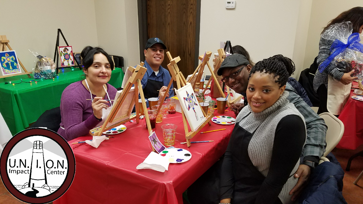Board Director Ramiro Alvarez, his wife and friends enjoying an evening of painting