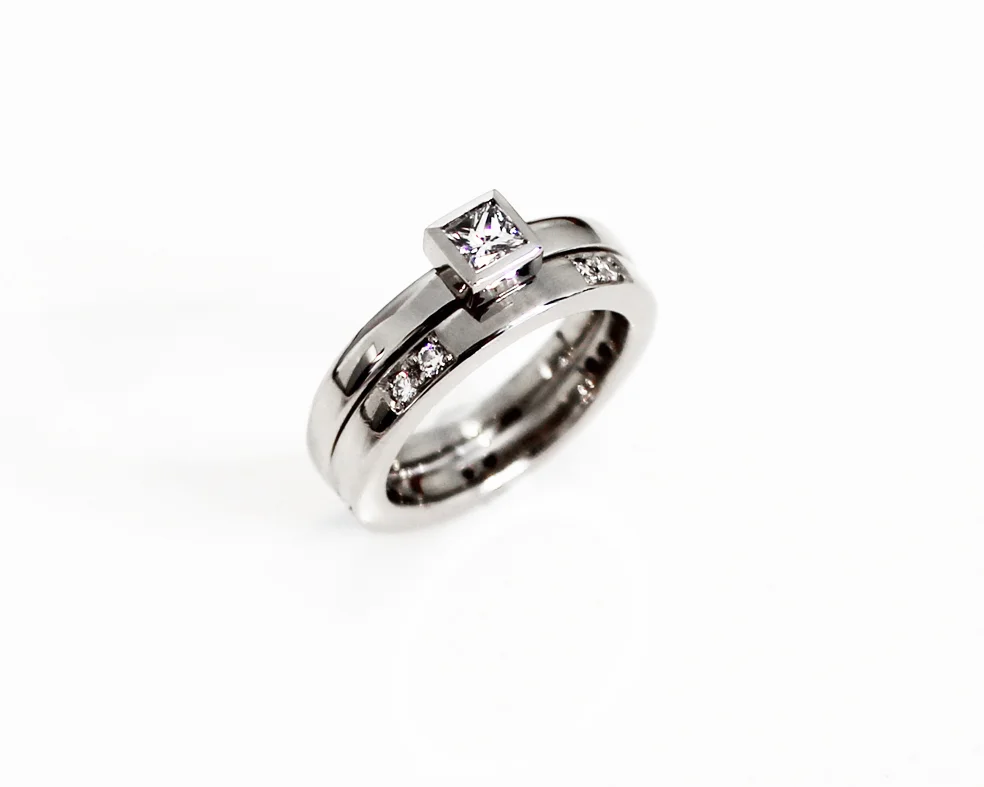 Engagement and wedding ring, white gold with diamonds.