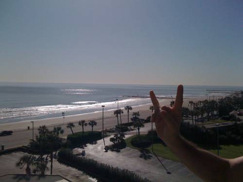 Bryan approves of our balcony view in Galveston. 