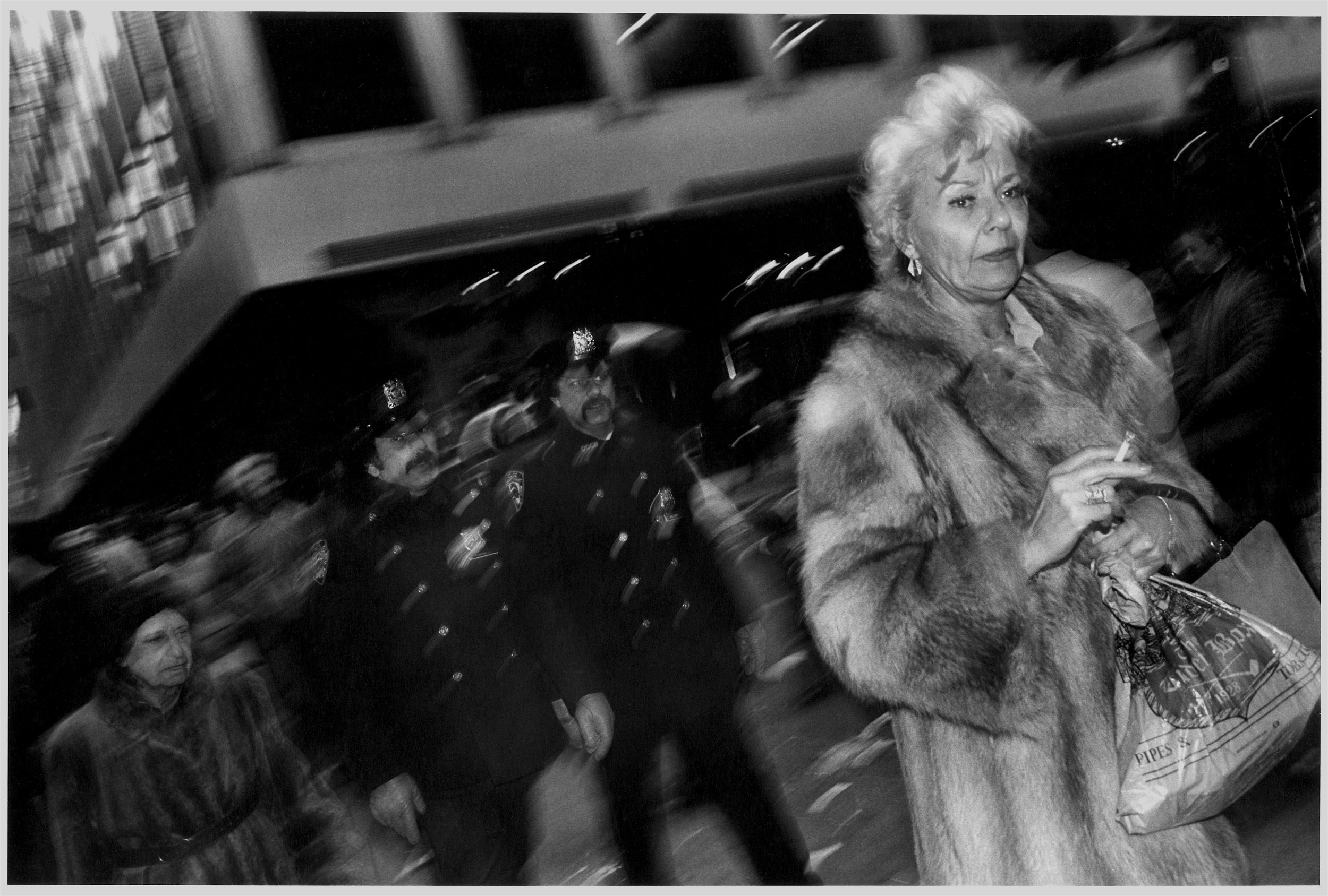 cops, woman in fur with cig, 5th ave., nyc, c. 1980