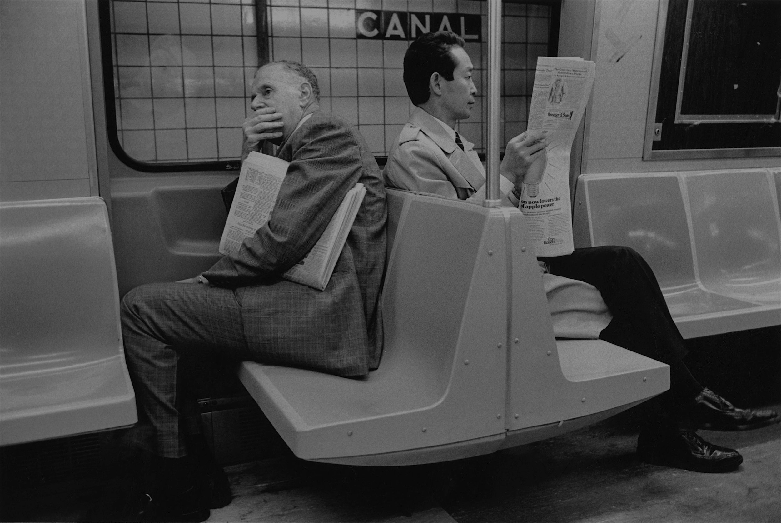 two times readers at canal st. subway, nyc, early 1980’s