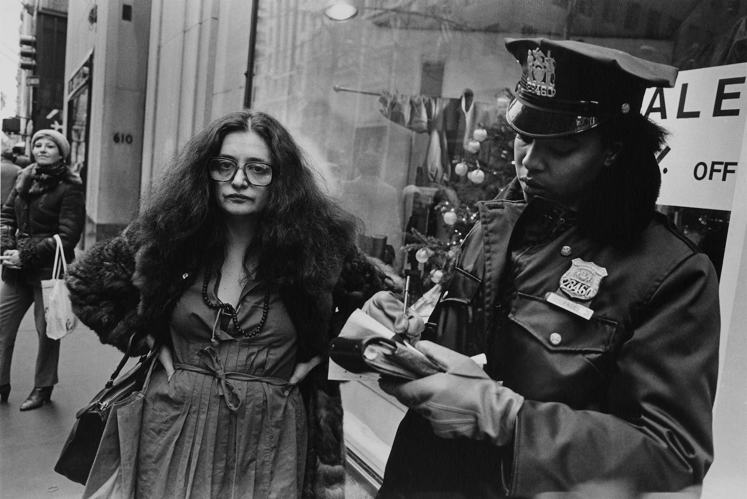traffic cop gives pissed woman a summons, 5th ave., nyc, late 1980’s