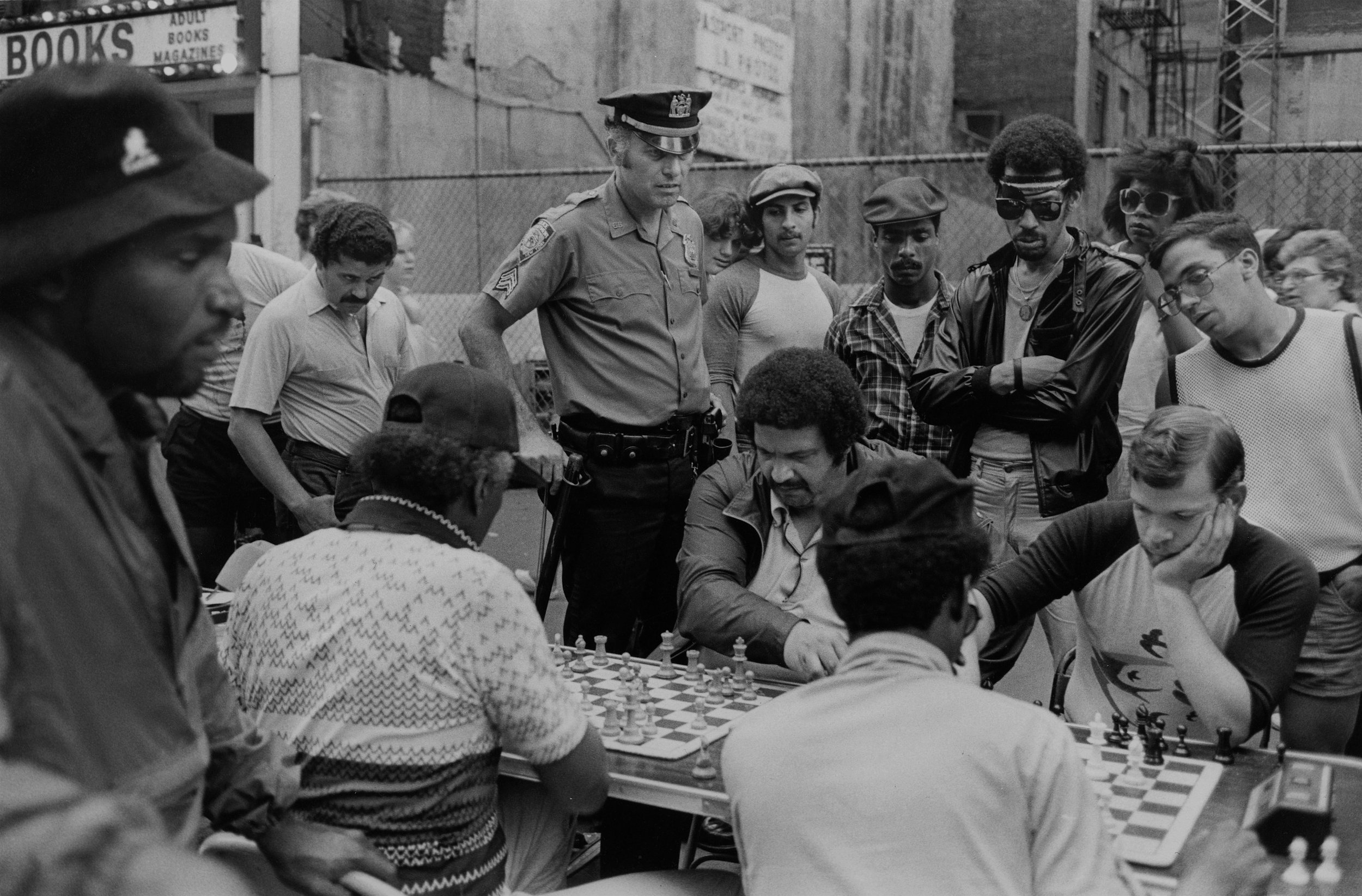 cop at chess tables, times sq., nyc, early 1980’s