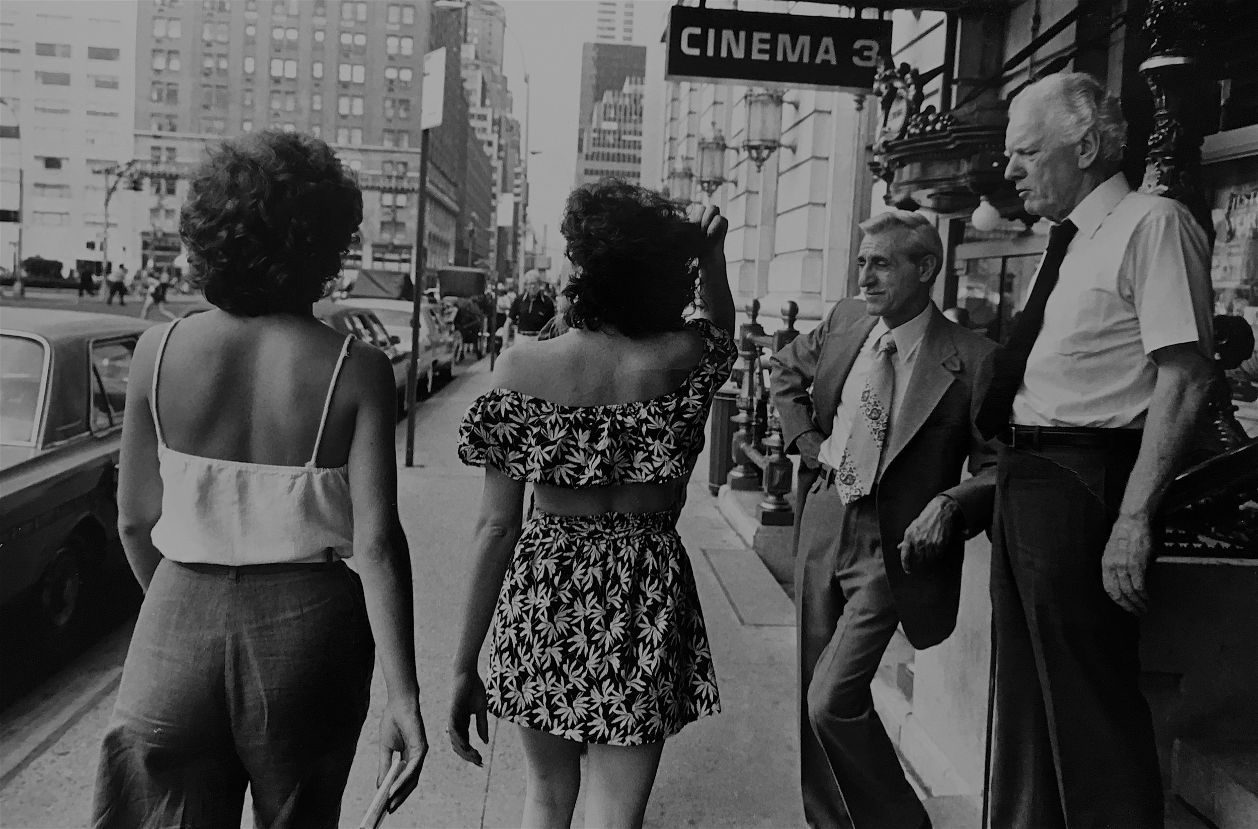 letcherous men ogle young women, 59th st., nyc, mid 1980’s