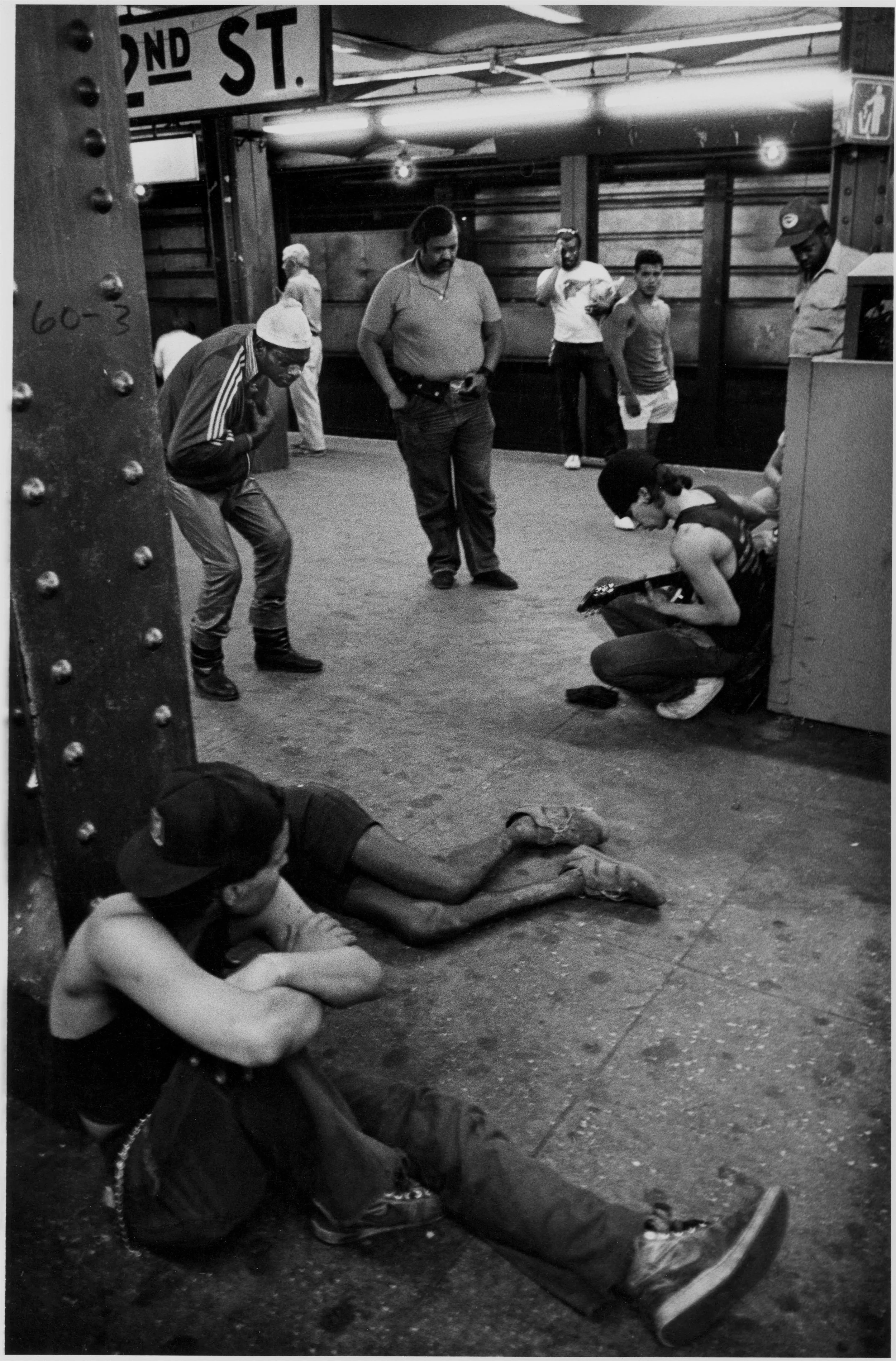 subway + splayed out humanity + music, nyc, c. 1984