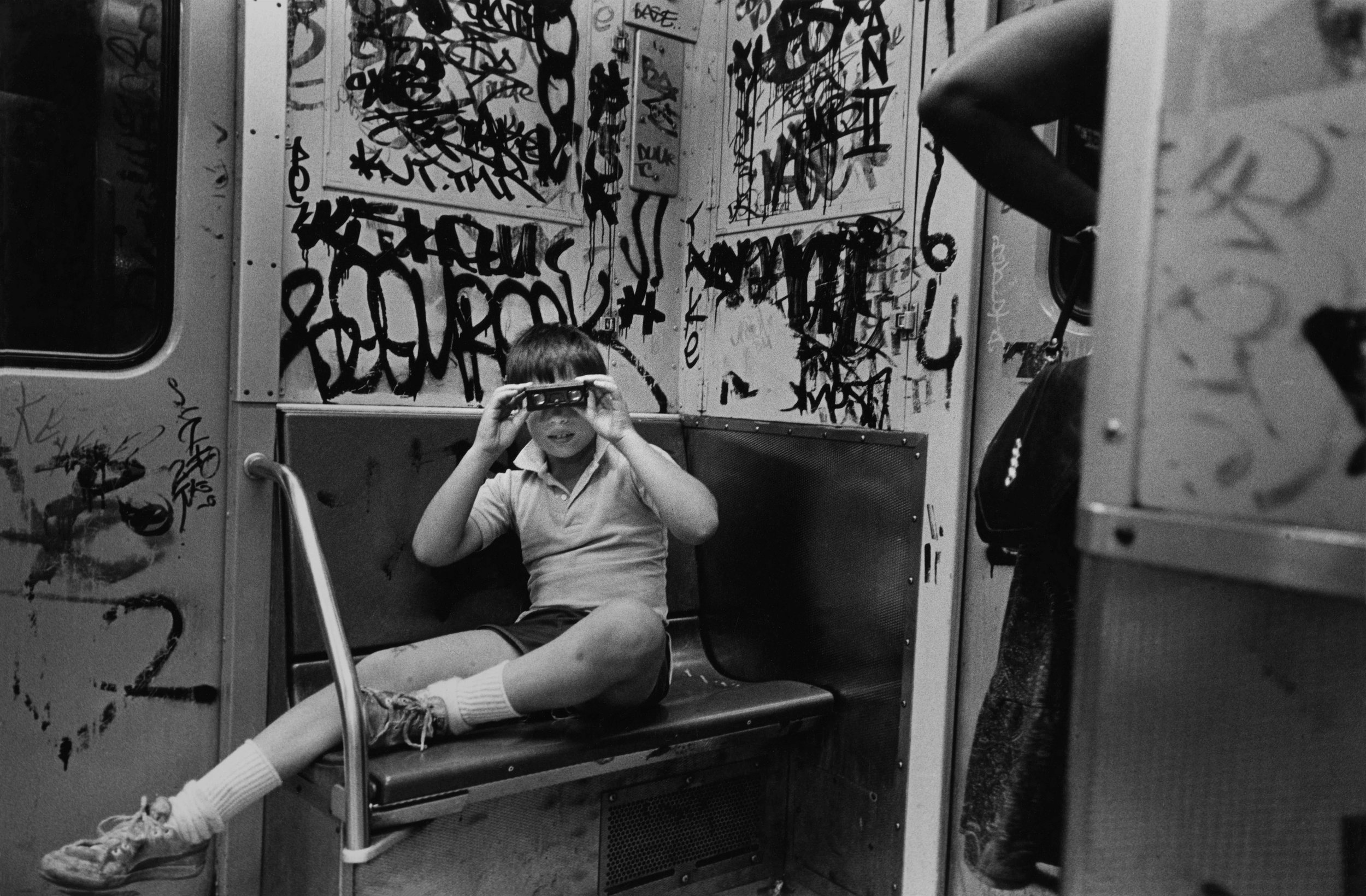 ben with opera glasses, subway, nyc, c. 1979