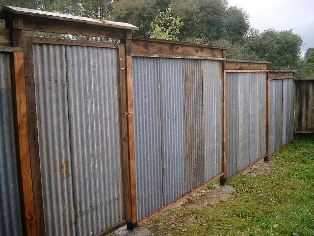 All Recycled Corrugated Metal Fence, How To Build A Corrugated Steel Retaining Wall