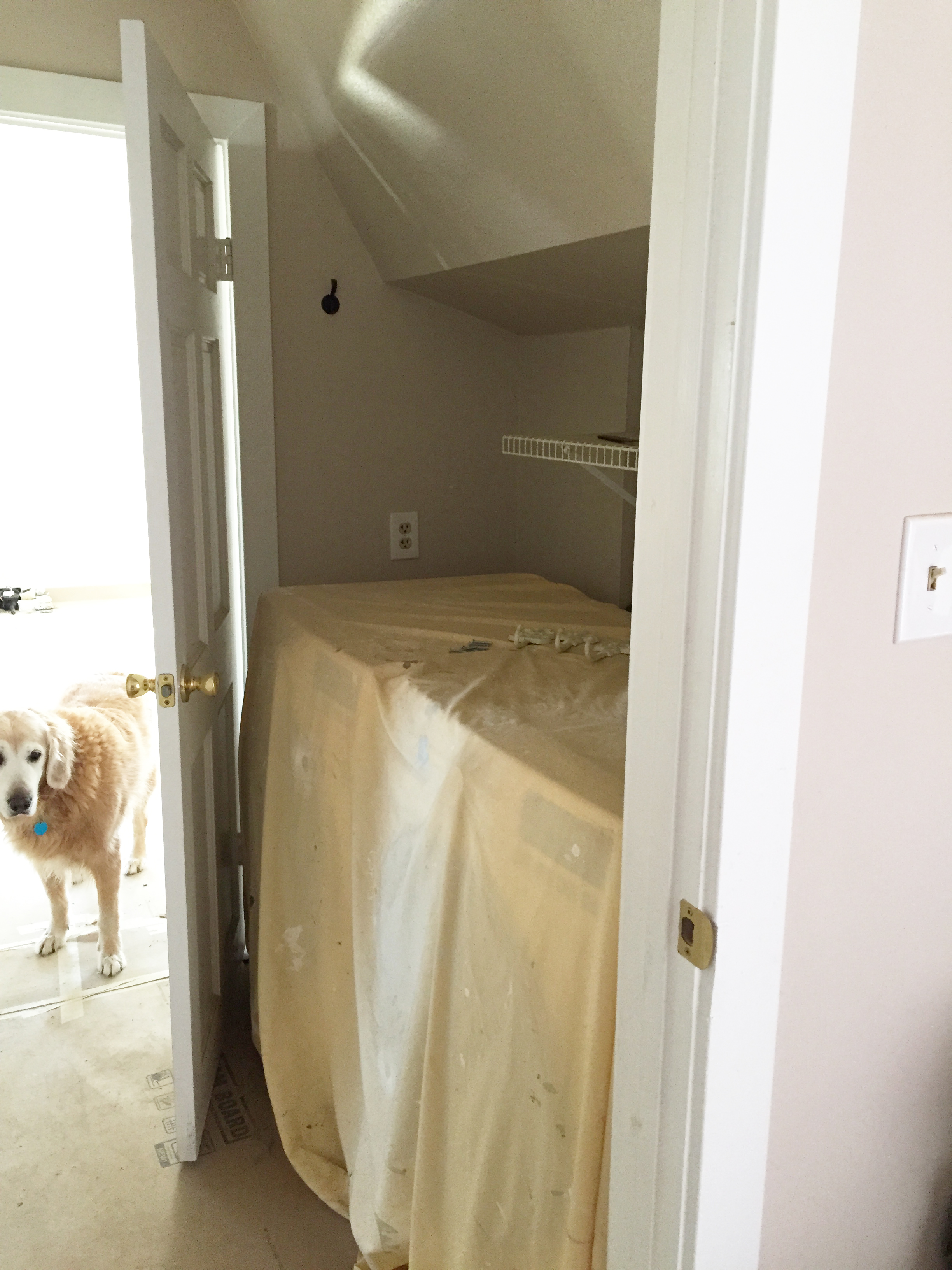 This raw photo (and the only one I could find because who wants a picture of this?) shows this space was once a laundry area in the house pre-renovation. Definitely not ideal as it is next to the main living area.