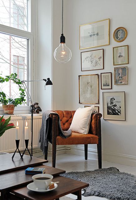 CORNER GALLERY WALL | via Apartment Therapy