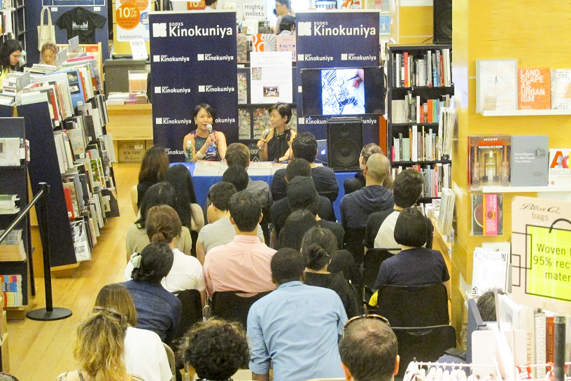 An audience watches the Yuko Shimizu panel