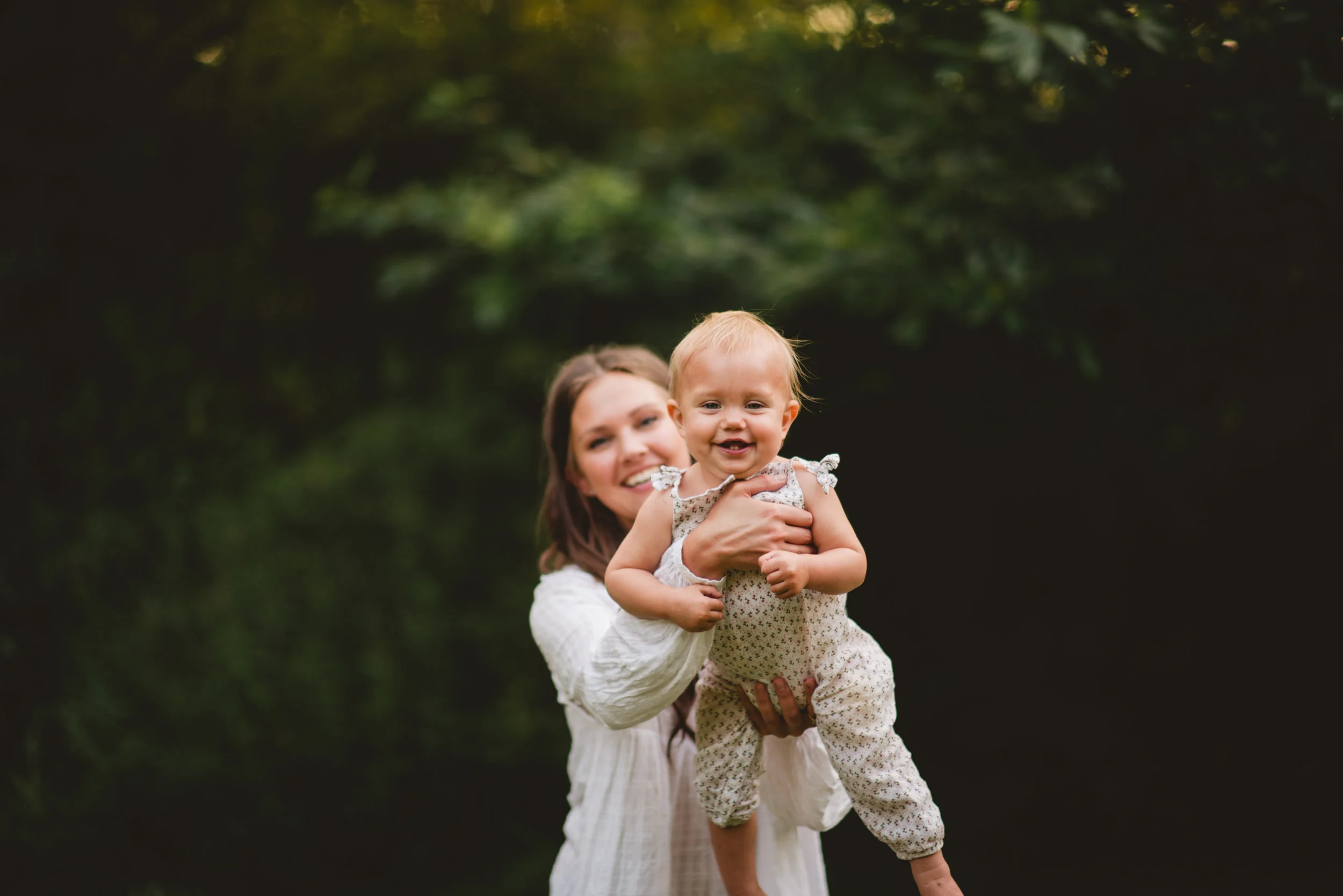 Airplane baby during a Mommy and Me photo session with Arius Photography