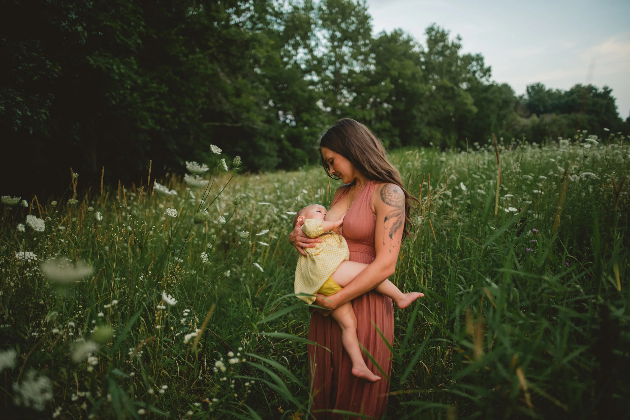 Nursing in a field of flowers in Upstate NY