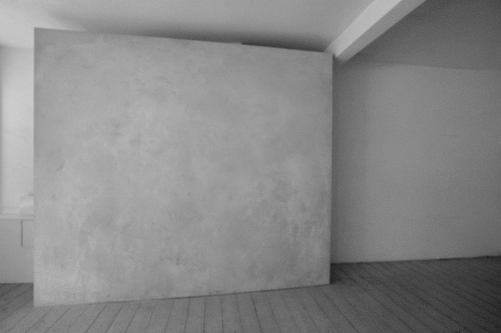 Surface: Untitled II , 1976 Grey Building Plaster on Plasterboard with Galvanised Beading 244cm (96") x 274cm (108") Installation at Lisson Gallery, London