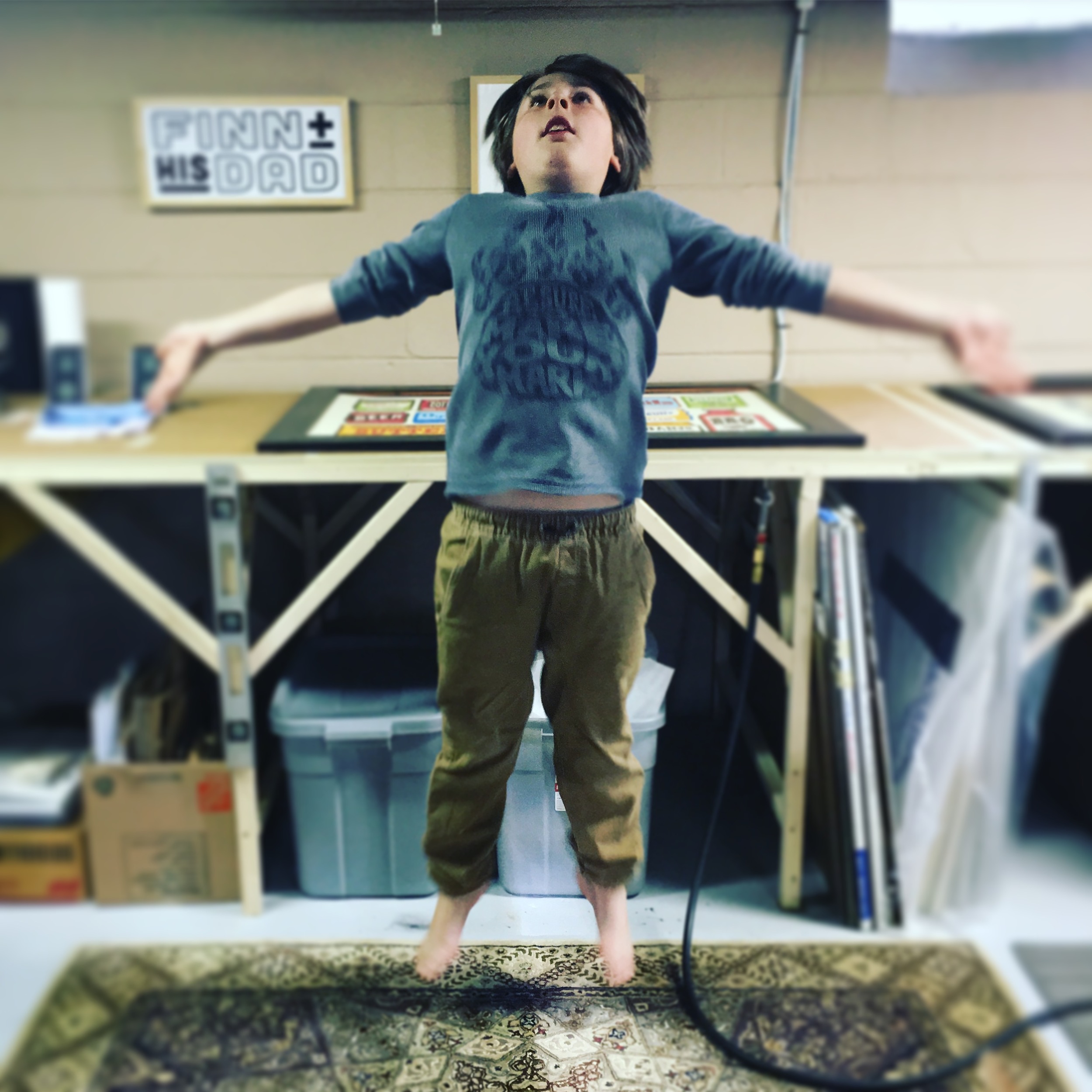 Finn levitates in the shop.