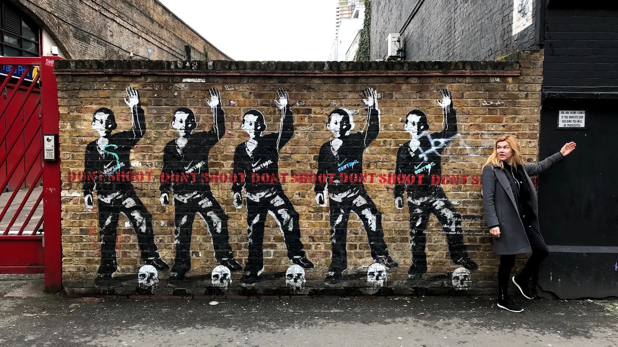 Street art Dont Shoot and A Broad In London.jpeg