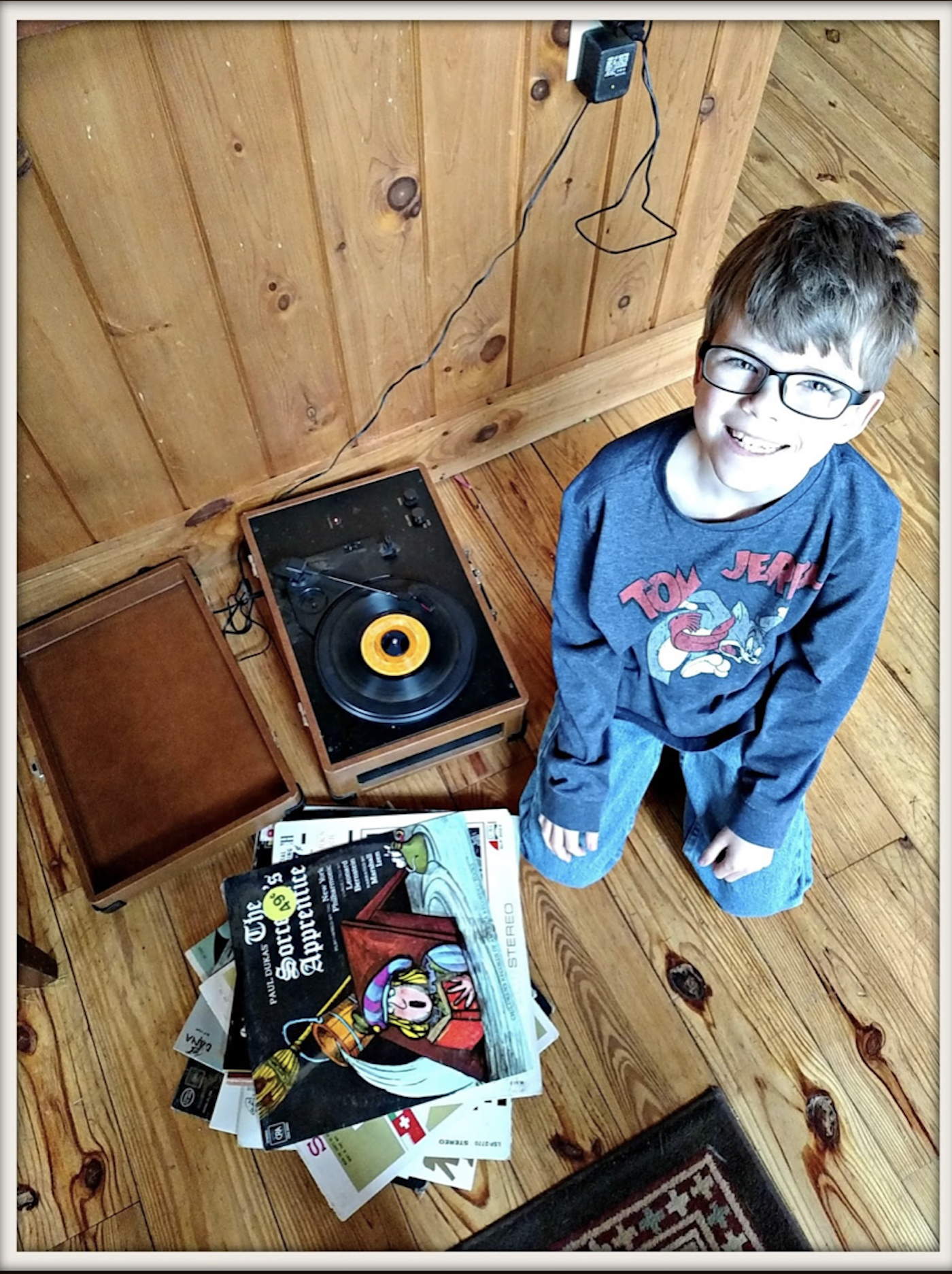 Little boy playing records .png