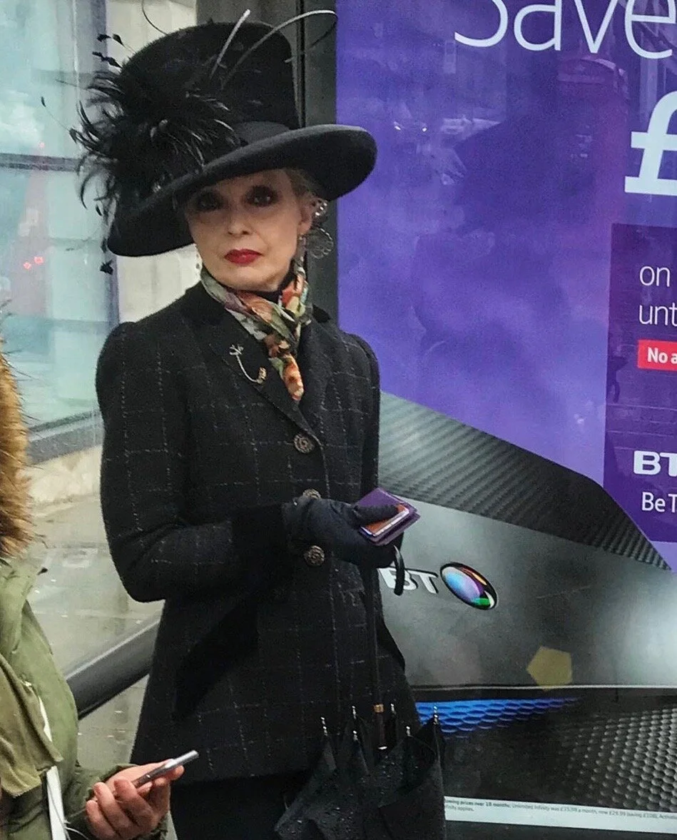 Lady waiting for the bus