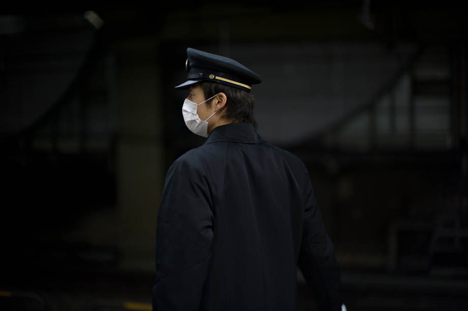 Train conductor at Shibuya Station in Tokyo