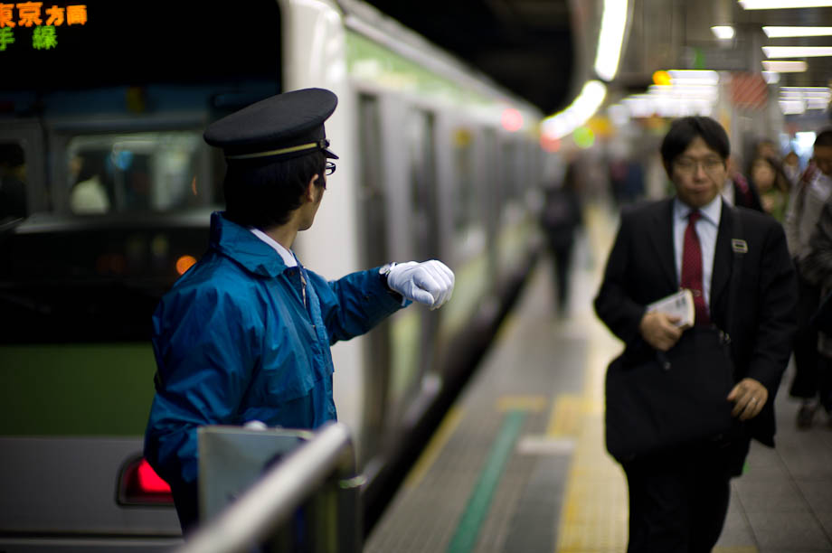 Timing the train at Shibuya Station in Tokyo, Japan