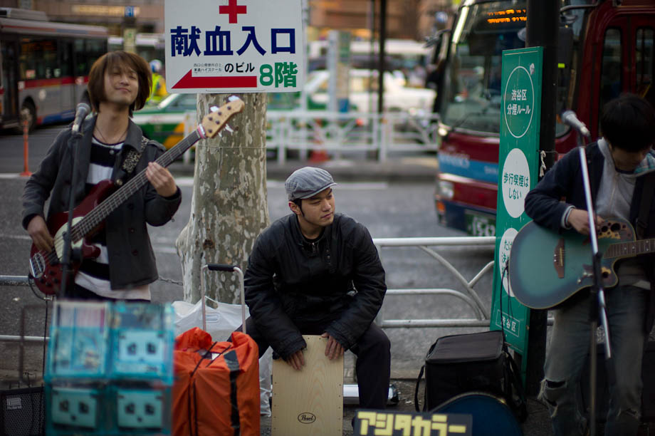 Bands outside train stations in Tokyo