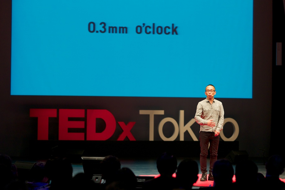 Taku Satoh speaking at TEDxTokyo 2013