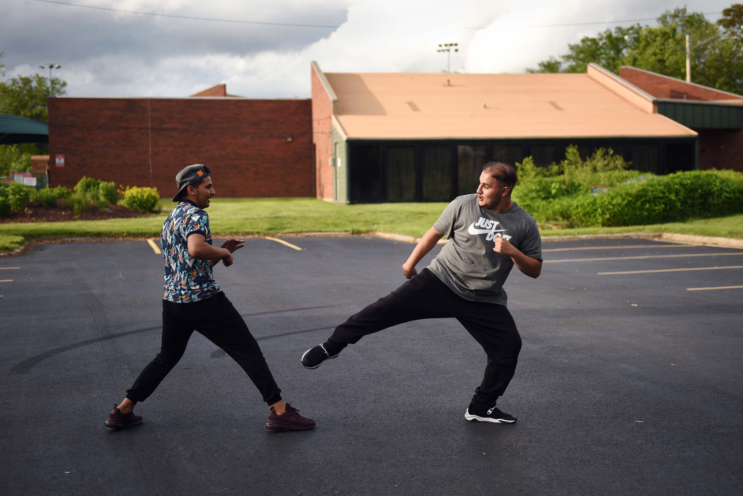  Abbas, 17, tried to land a kick on his younger brother, Hussein Al Hraishawi, 15, while practicing Karate on Saturday, May 12, 2019, in a parking lot near their home in Columbia, Missouri. The brothers learned Karate from their uncle while growing u