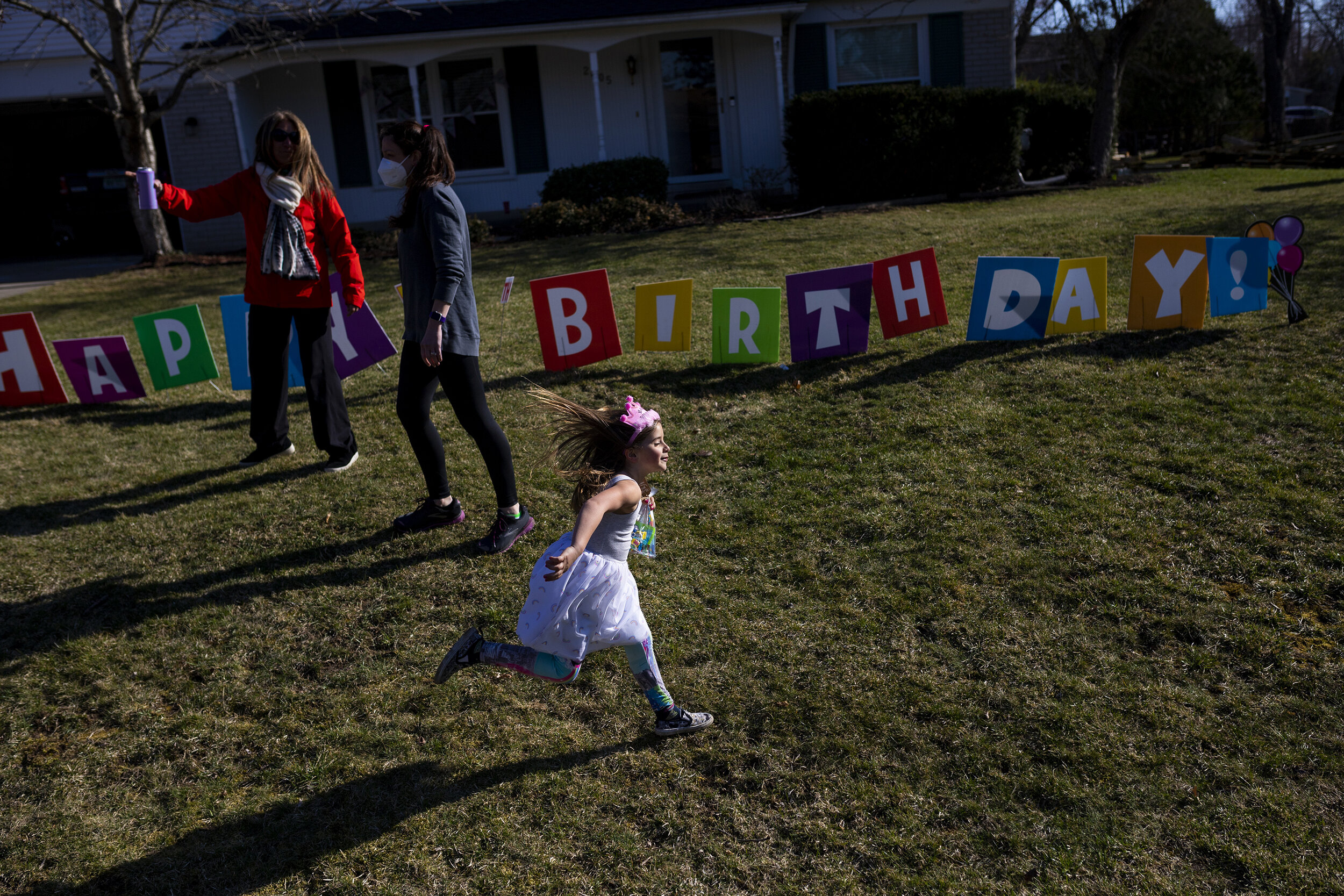  Bella Vernon, 6, runs through her front-yard on during her birthday celebrations on Monday, March 29, 2021, in Troy. 