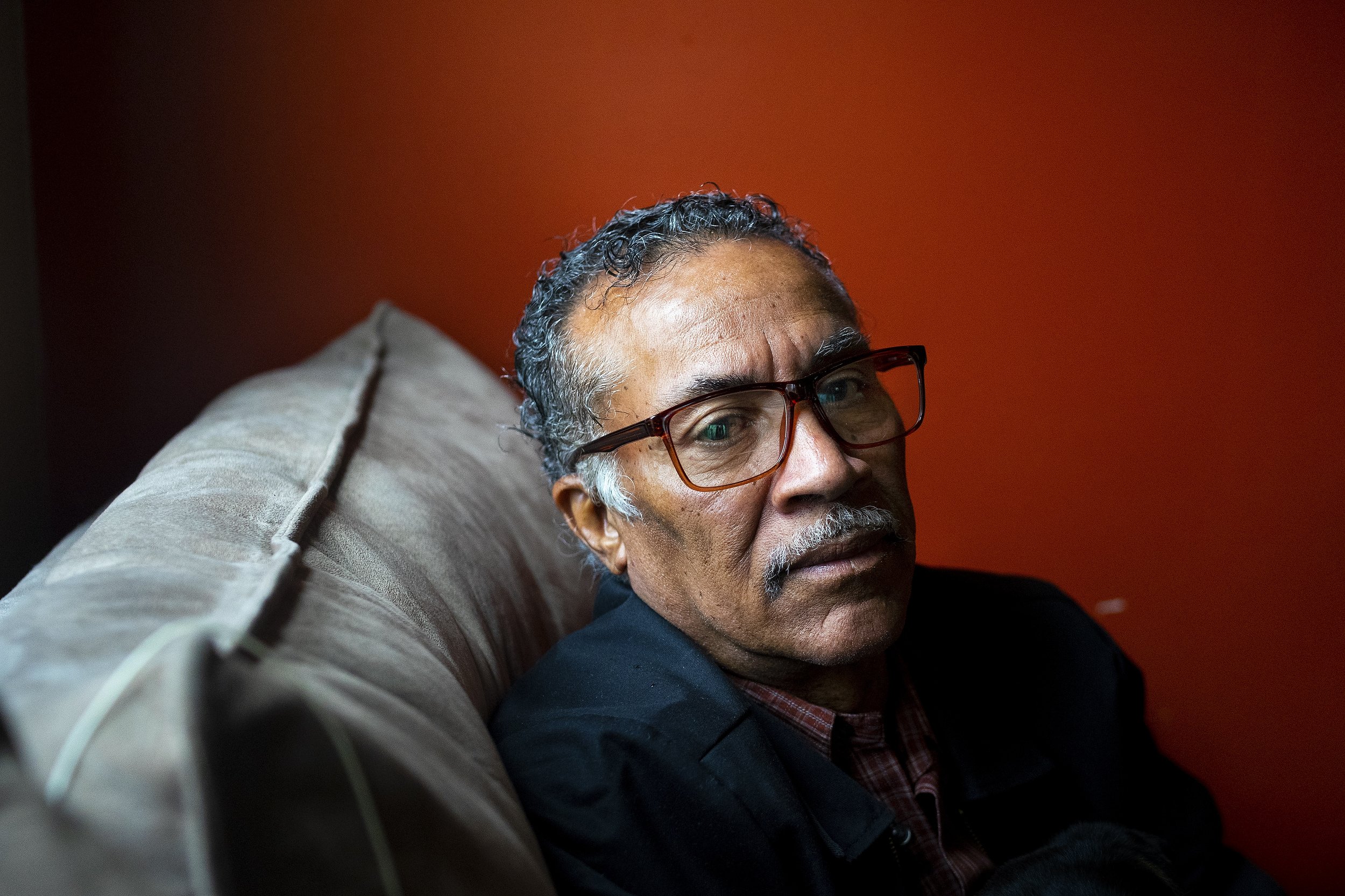  Lee Earley poses for a portrait inside his home on Thursday, April 8, 2021, in Detroit. Earley, 65, has been trying to start a private security guard agency, but his two felony convictions from over 20 years ago for cashing a bad check and carrying 