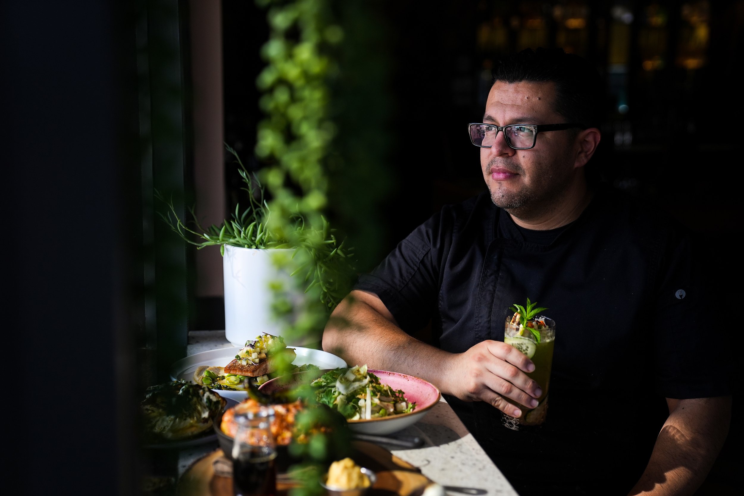  Saul Velazquez, Executive Chef at Sante, poses for a portrait with an assortment of dishes on Thursday, May 5, 2022, in Scottsdale. “We want you to eat well, but still feel good,”  Velazquez said. The chef hopes his restaurant brings a California-es