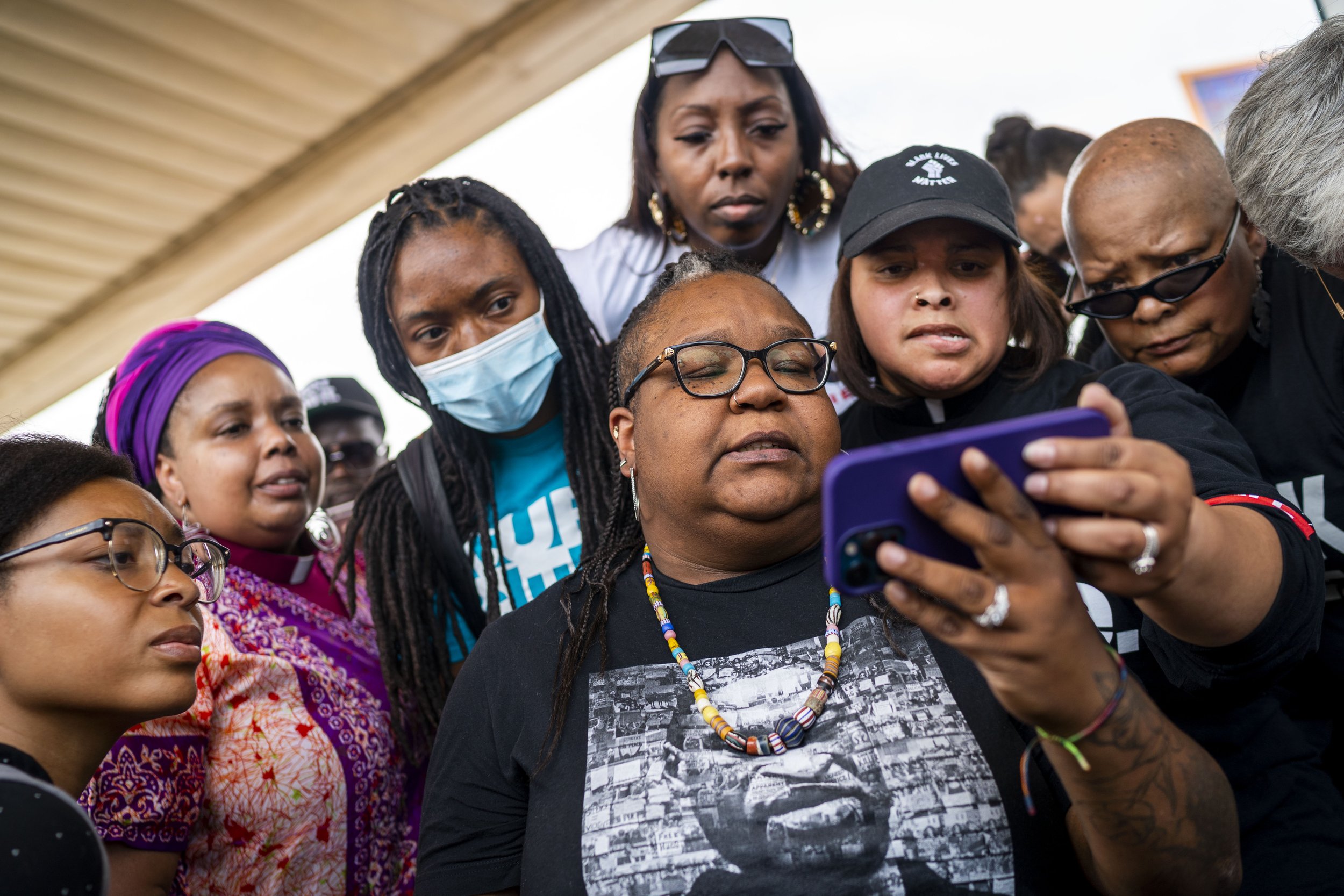  Jennifer Starr Dodd, center, and a group of people wait to hear the sentencing verdict of former Minneapolis police officer Derek Chauvin at George Floyd Square on Friday, June 25, 2021, in Minneapolis. Chauvin was sentenced to 22 and half years in 