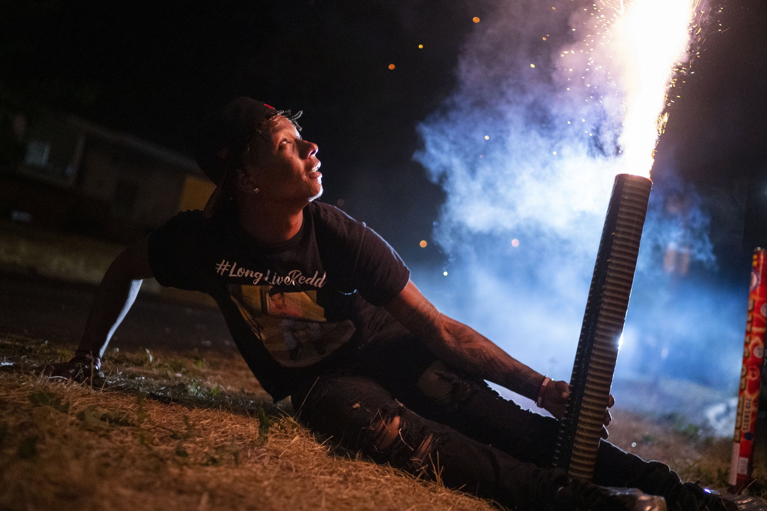  Emajay Driver, best friend of Daunte Wright, holds a firework in place during a Fourth of July celebration in his late friend's honor on Sunday, July 4, 2021, in Brooklyn Center. Wright was killed by former Brooklyn Center police officer Kimberly Po